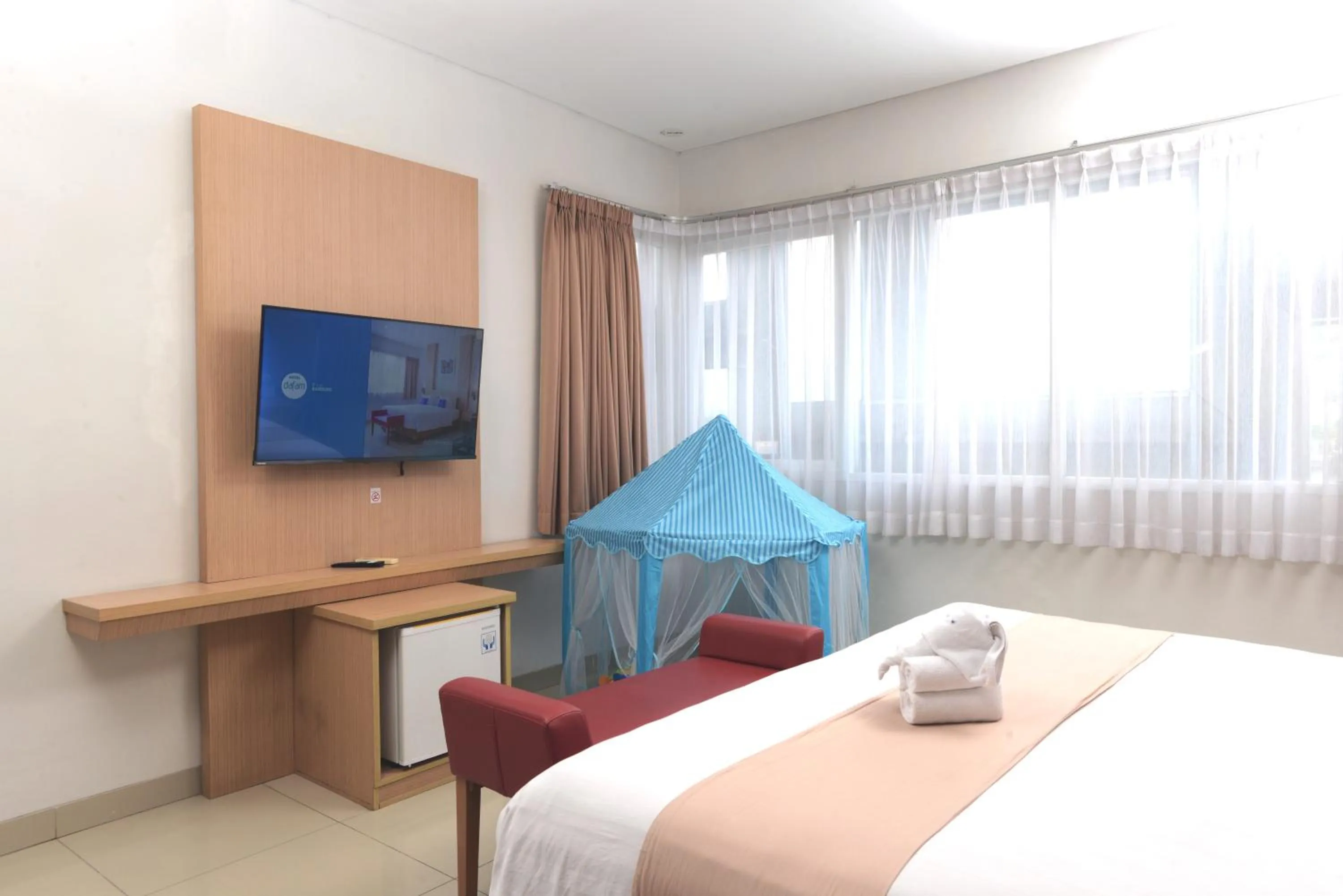 Photo of the whole room, Bed in Hotel Dafam Rio