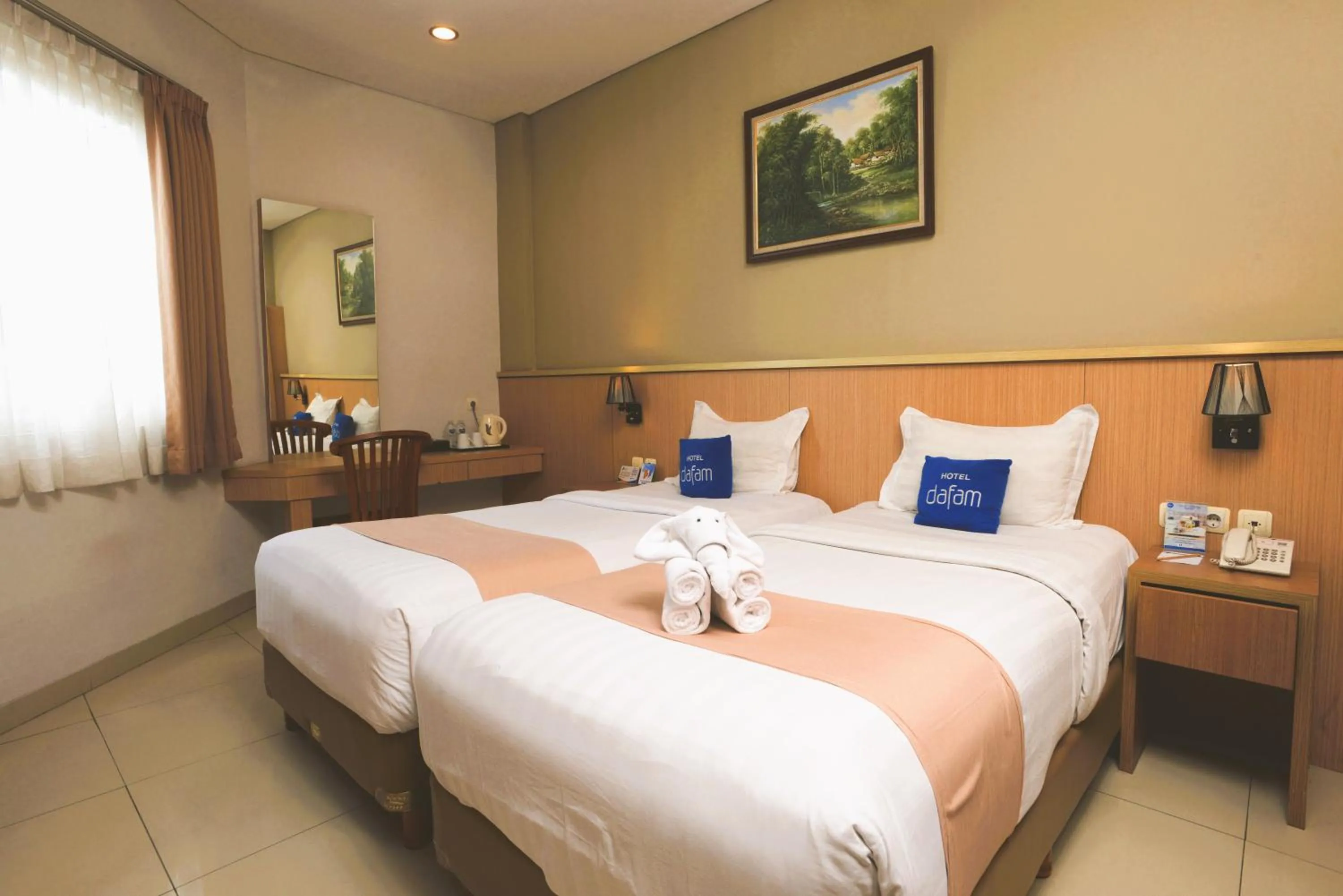 Bed in Hotel Dafam Rio