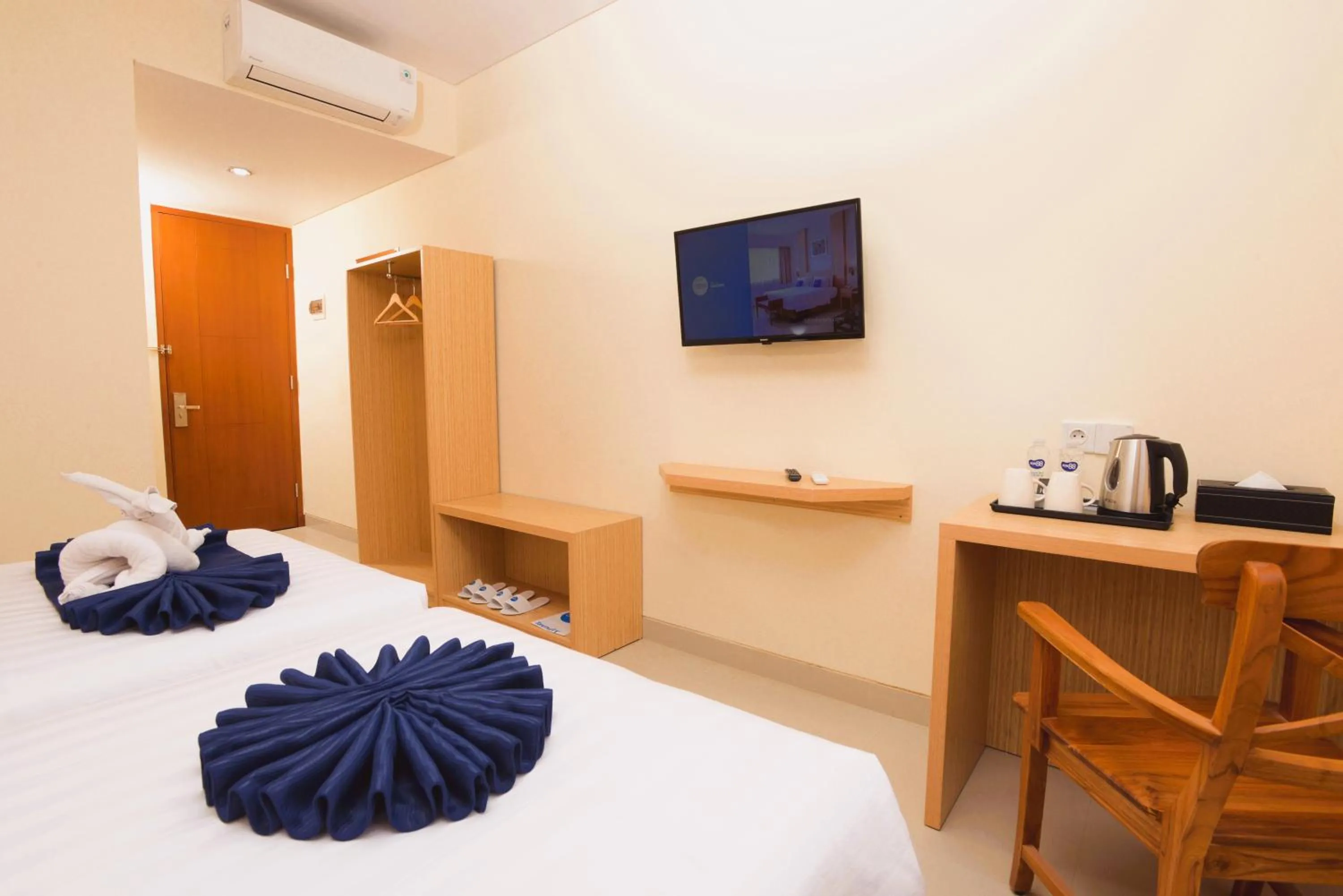 Bed in Hotel Dafam Rio