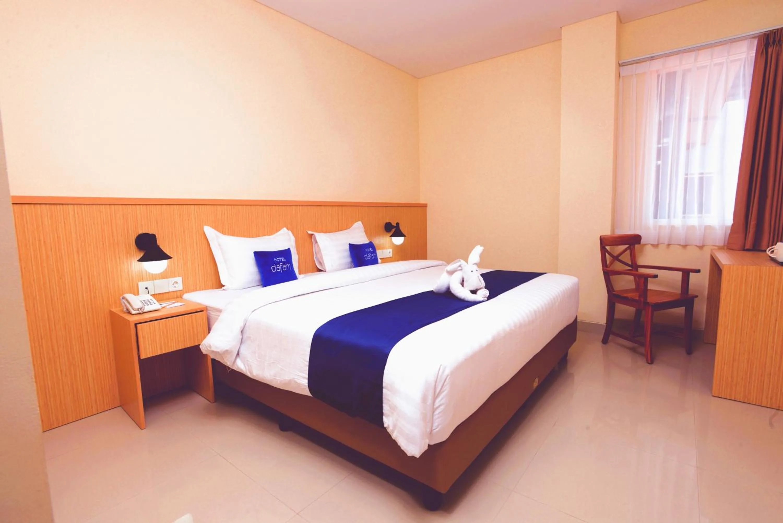 Bed in Hotel Dafam Rio