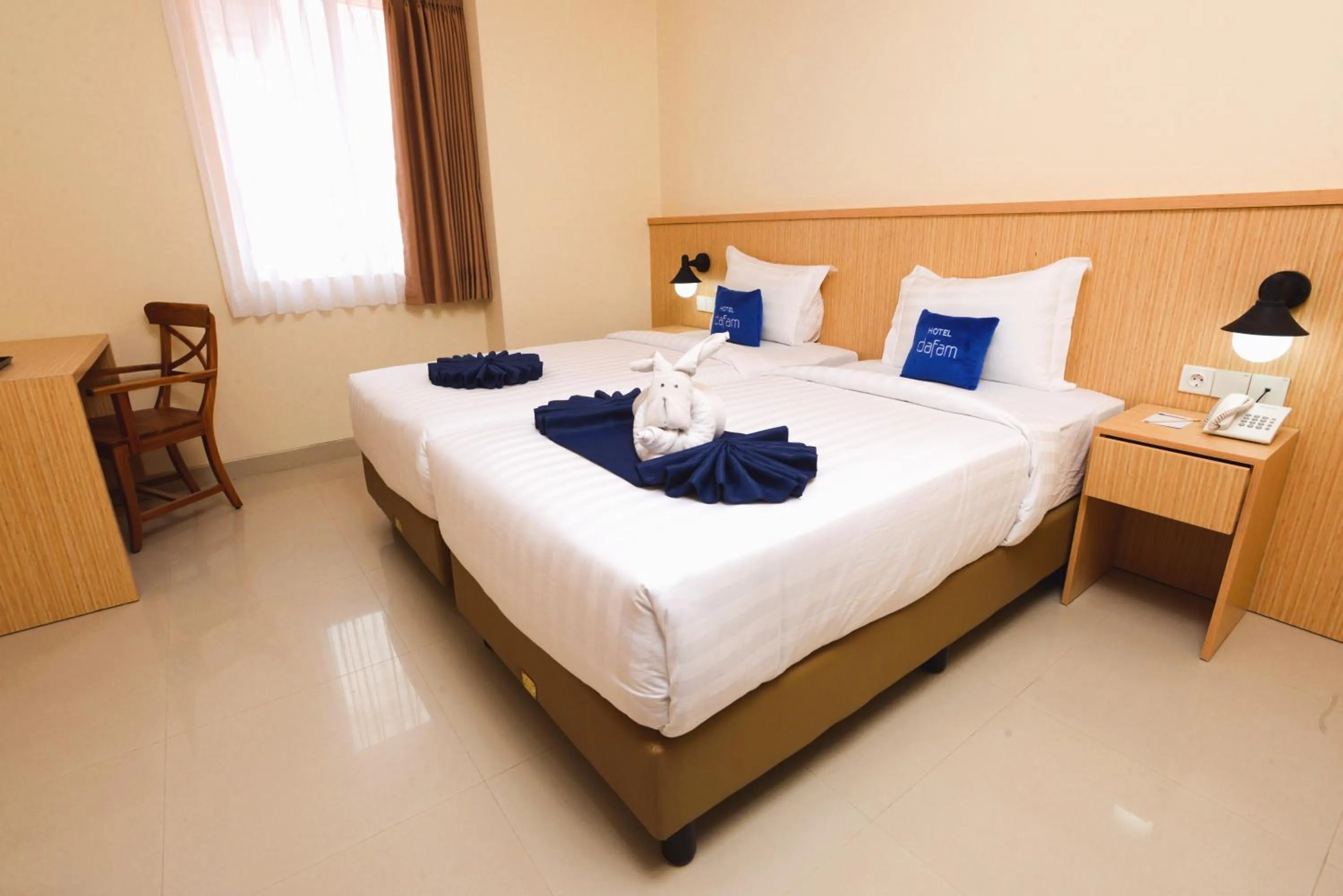 Photo of the whole room, Bed in Hotel Dafam Rio