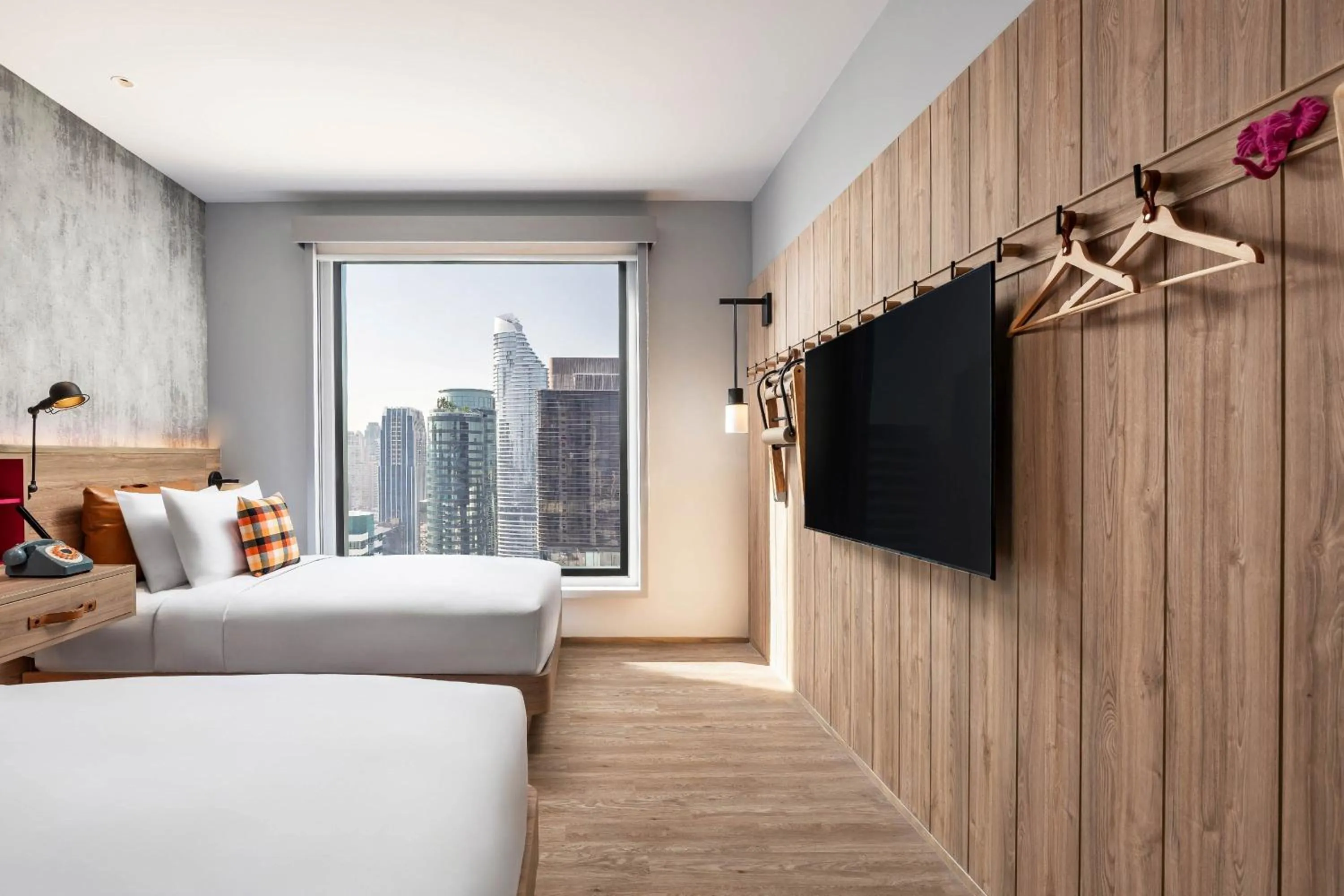 Photo of the whole room, Bed in Moxy Bangkok Ratchaprasong