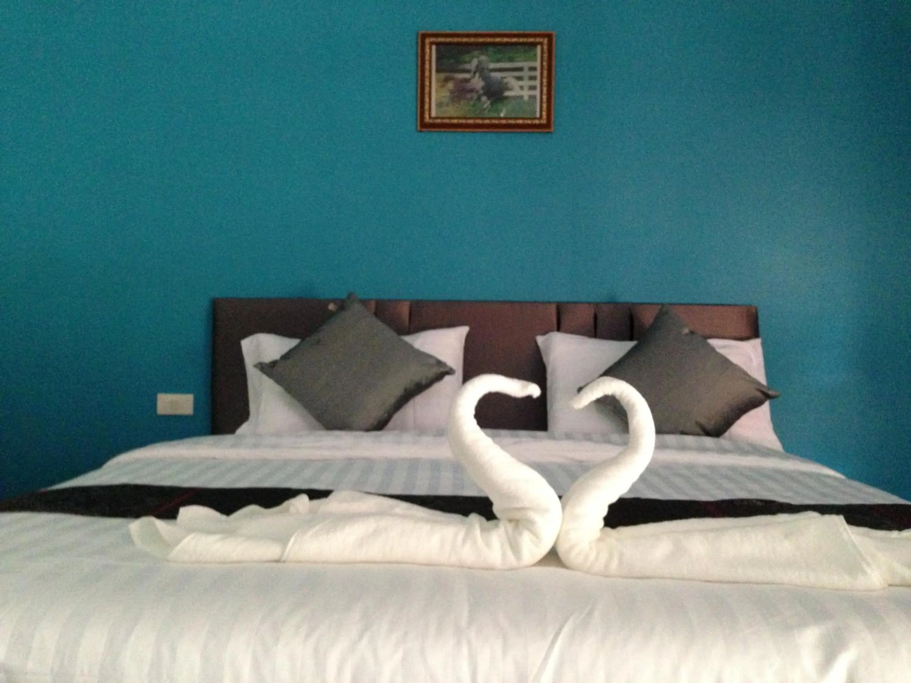 Bed in Baan Rai Phufah Resort Chiangrai