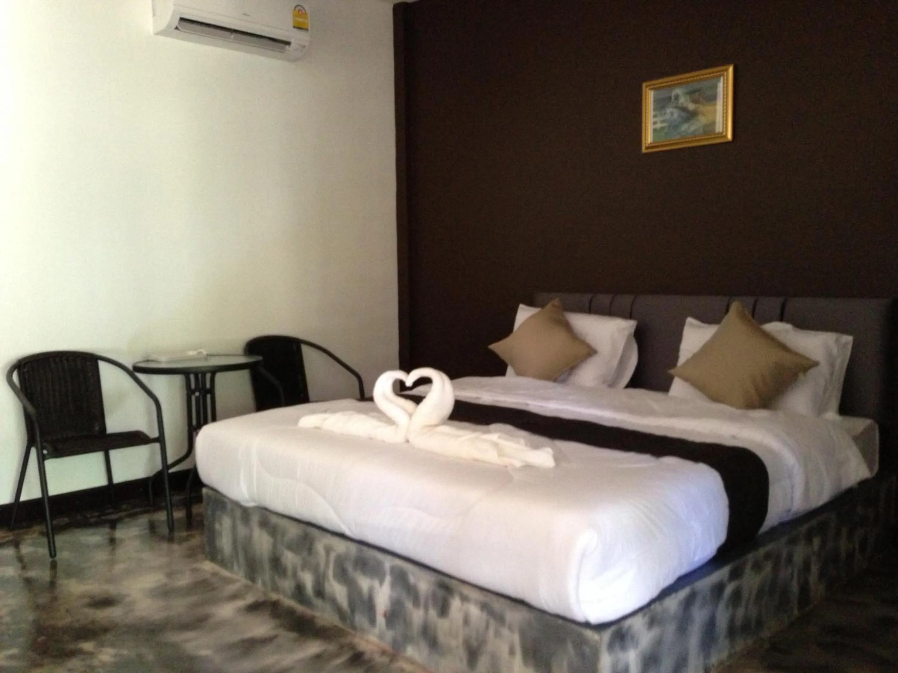 Bed in Baan Rai Phufah Resort Chiangrai