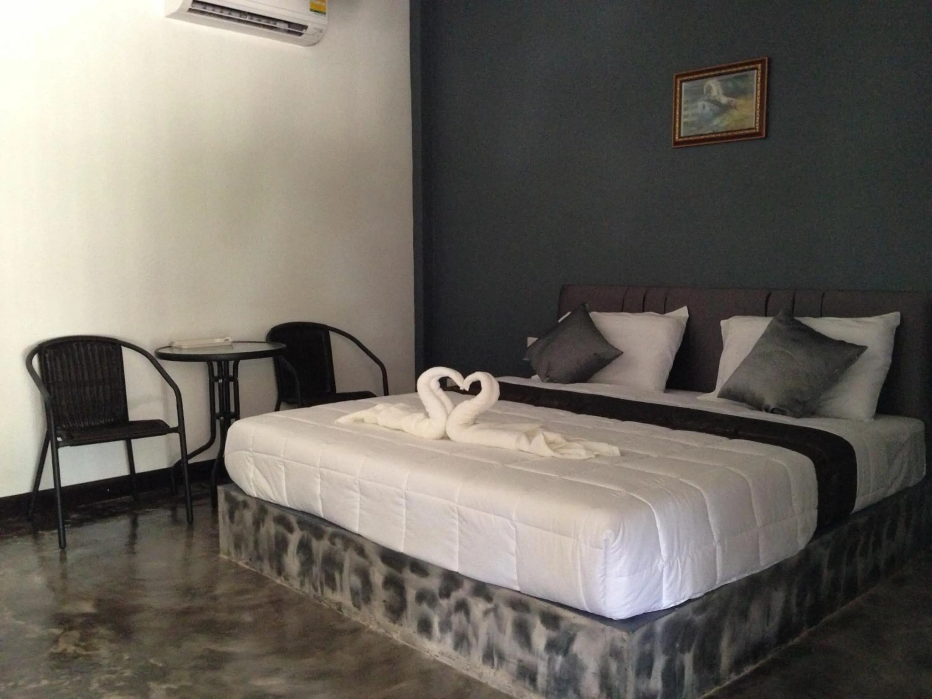 Bed in Baan Rai Phufah Resort Chiangrai