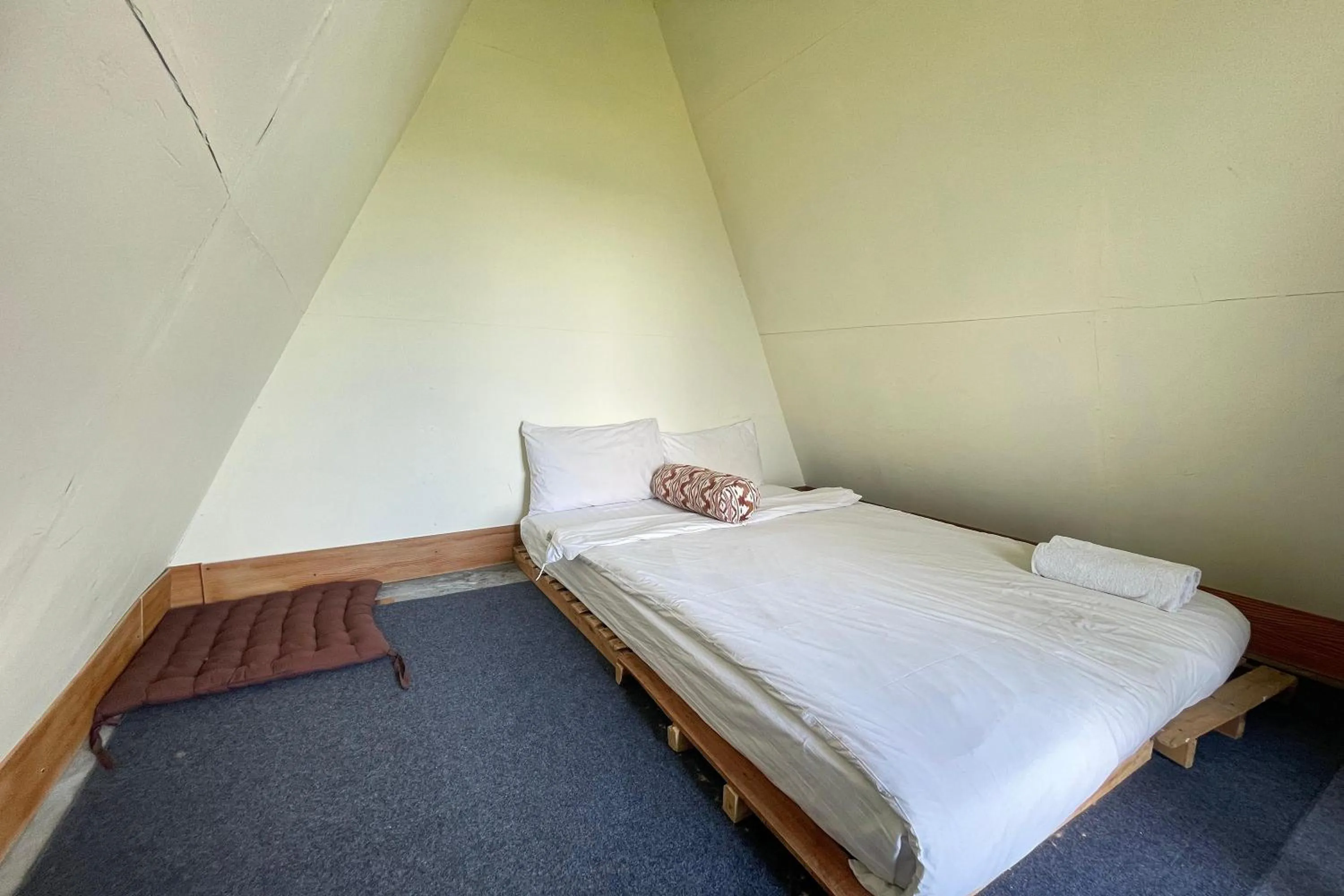 Bed in Double U Camp and Villa