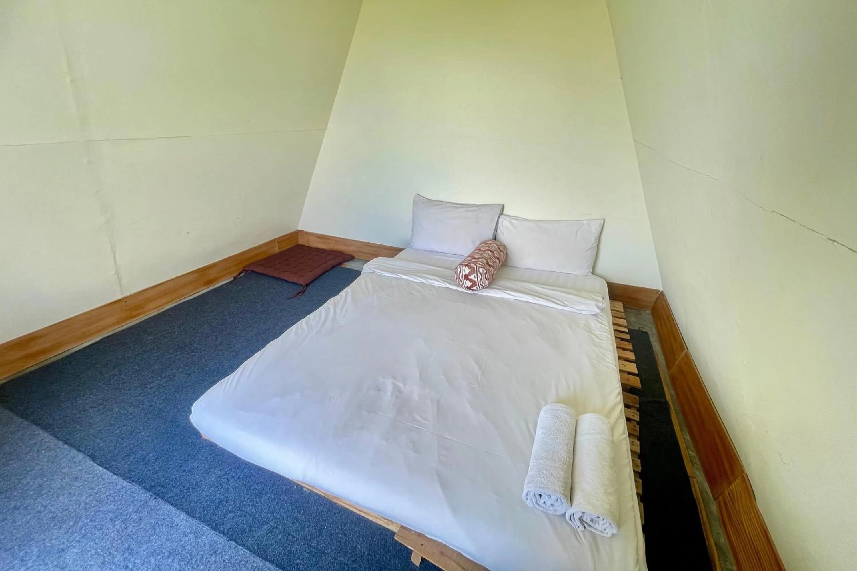 Bed in Double U Camp and Villa