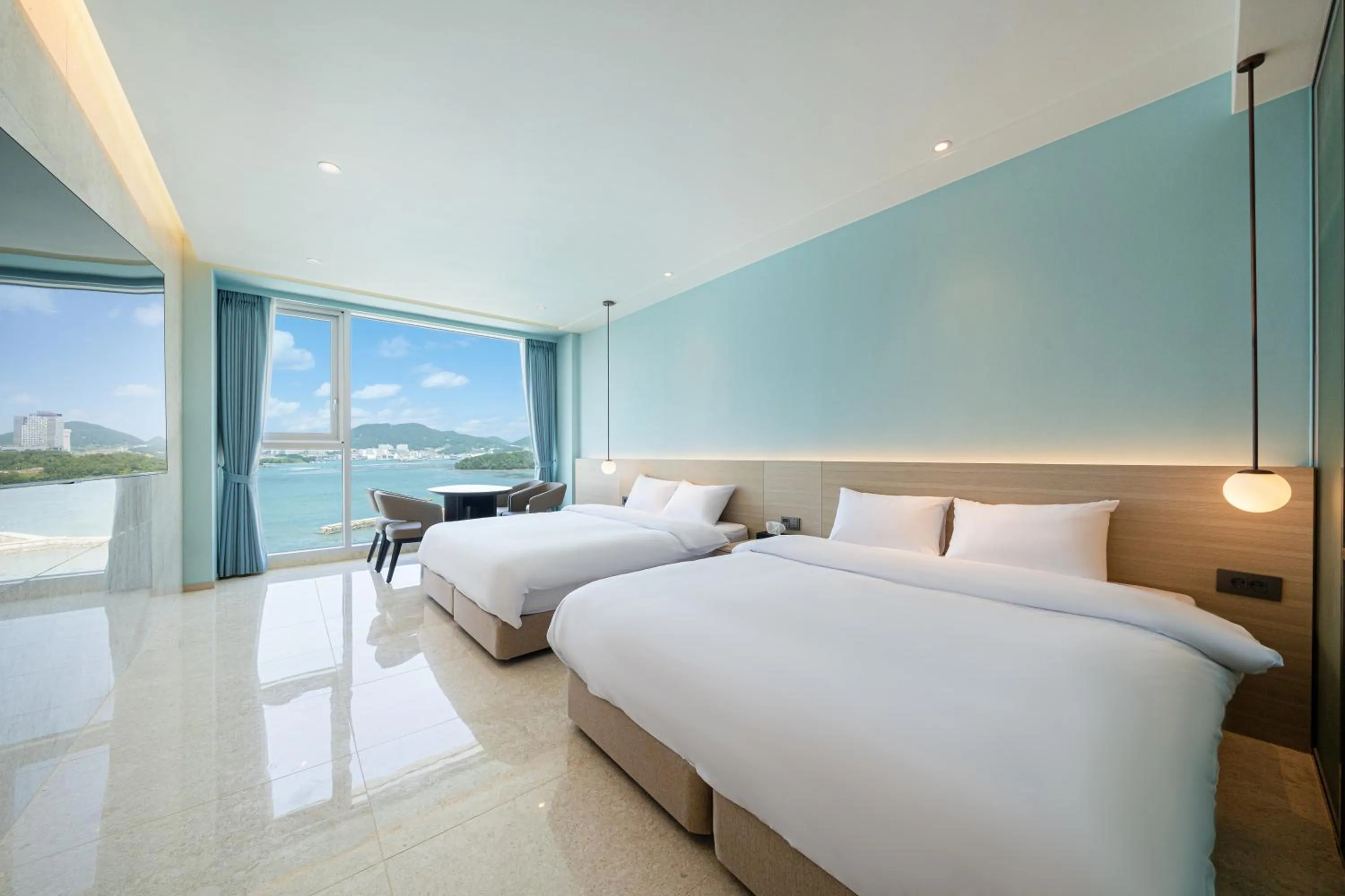 Bed in Yeosu Calacatta Hotel & Resort