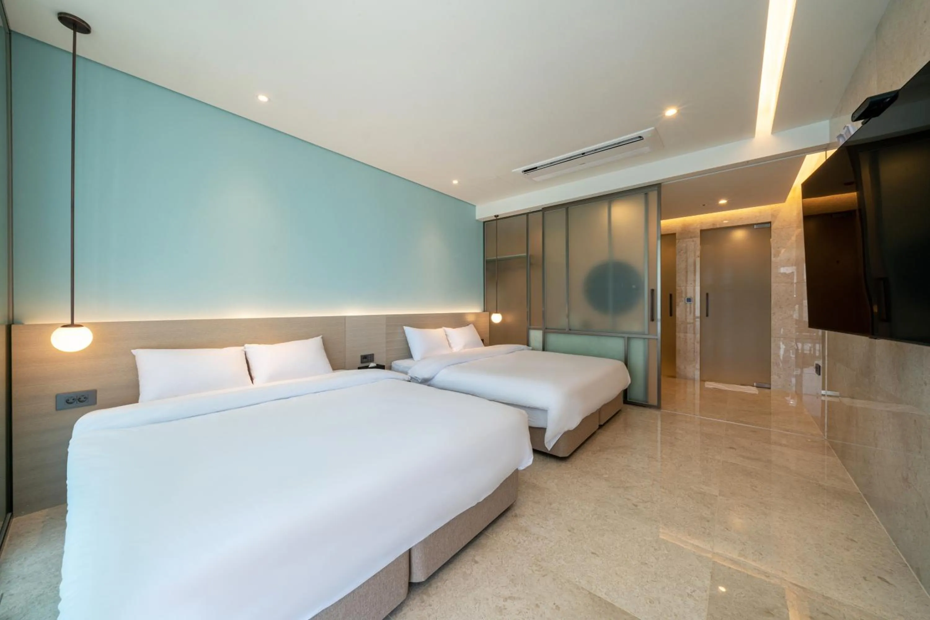 Bed in Yeosu Calacatta Hotel & Resort