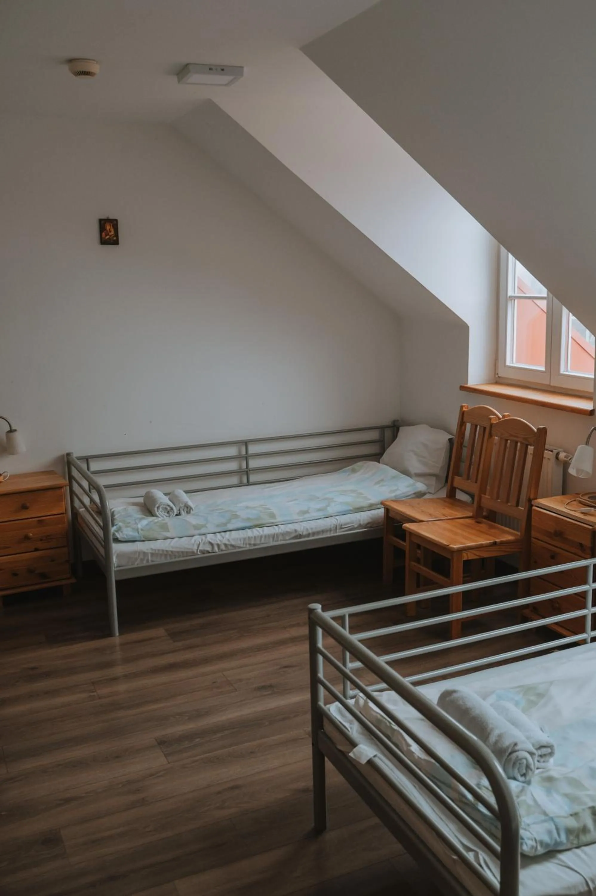 Bed in Pokoje Gościnne Domu Pielgrzyma w Supraślu