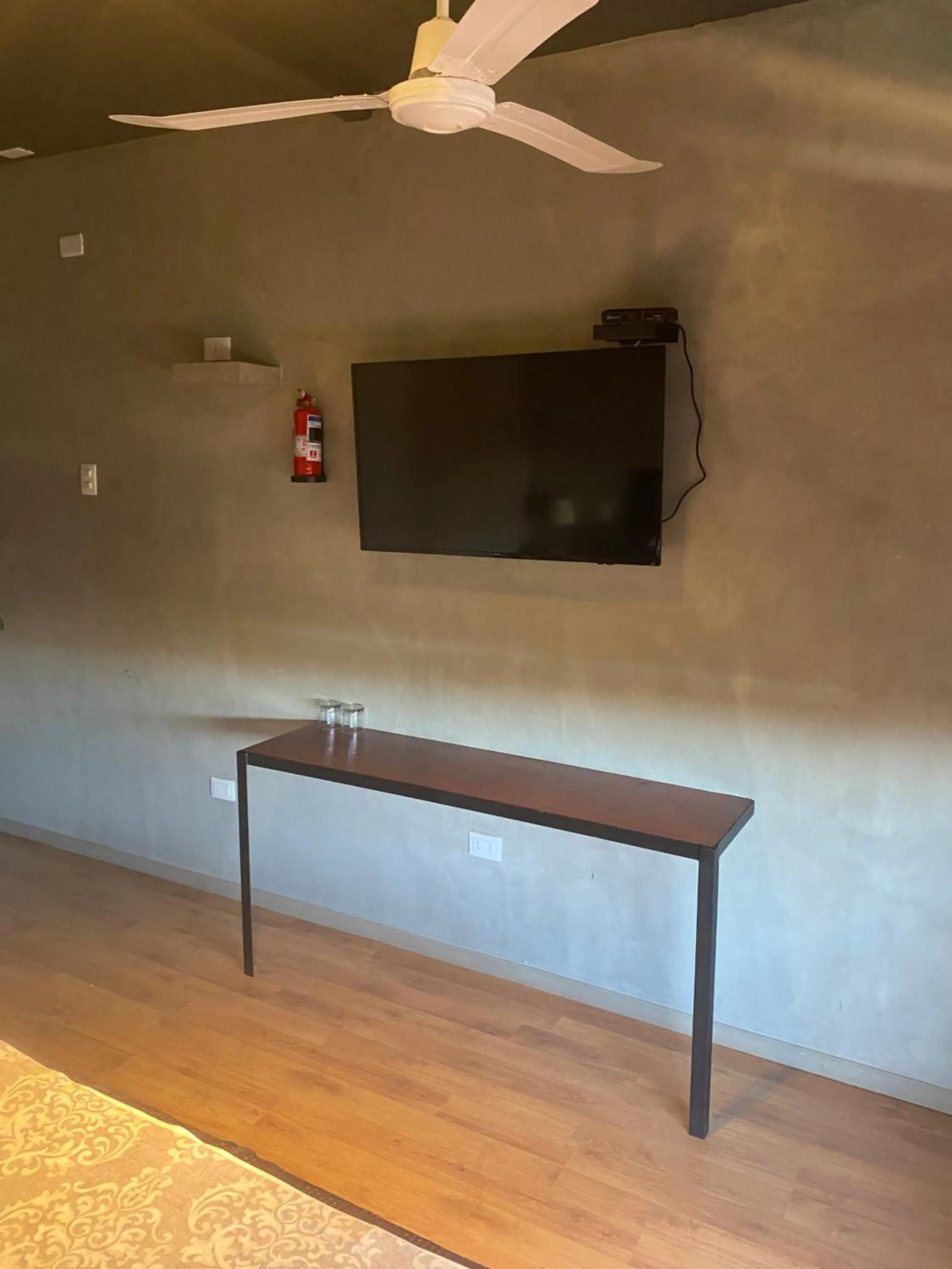 Communal lounge/ TV room in Hoteles Pueblo de Tierra