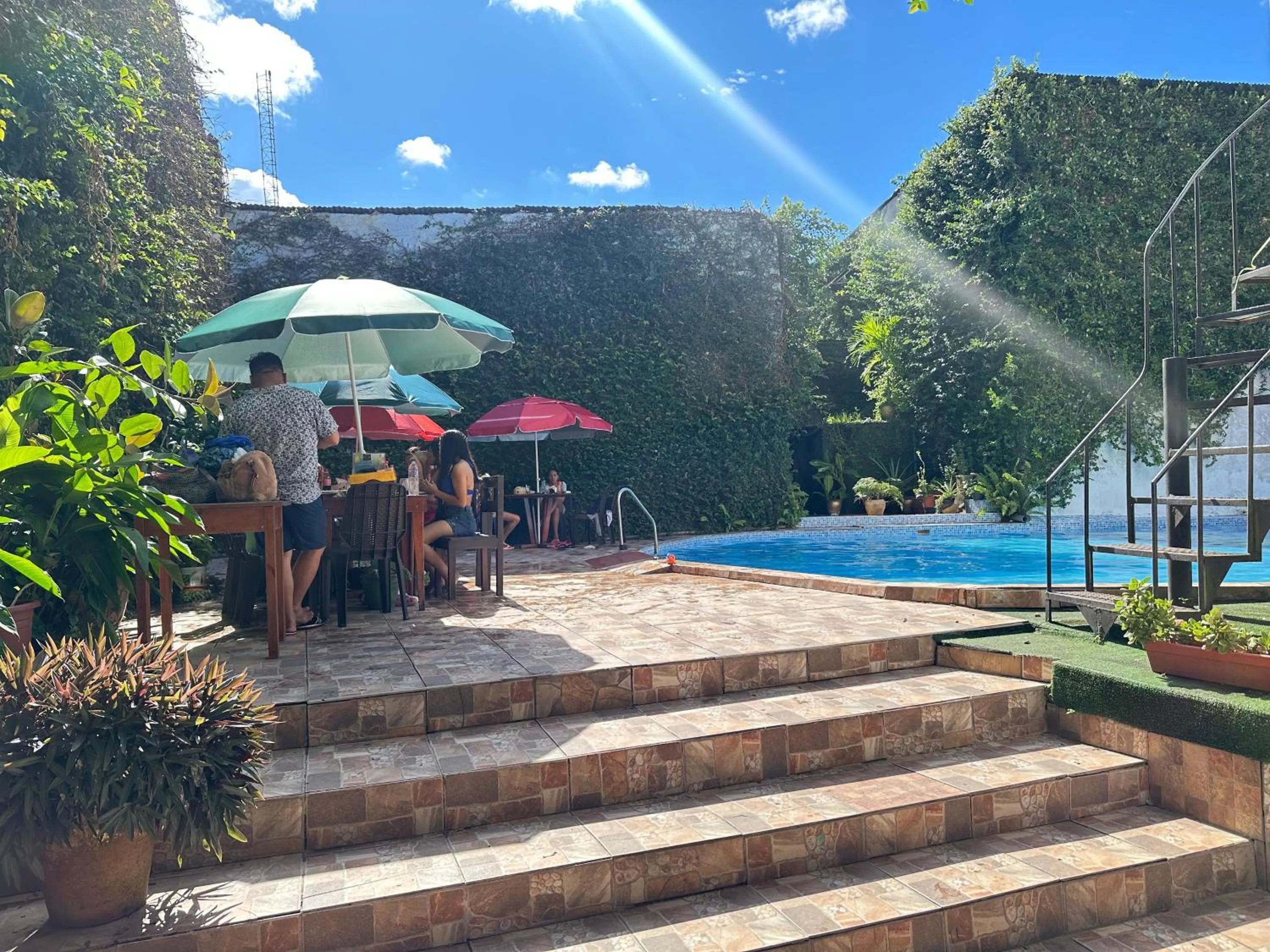 Swimming pool in La Posada del Cauchero Hotel & Suites