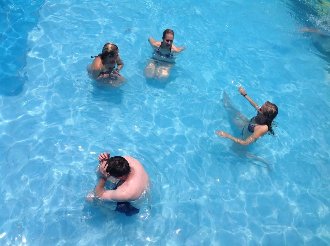 Swimming pool in La Posada del Cauchero Hotel & Suites
