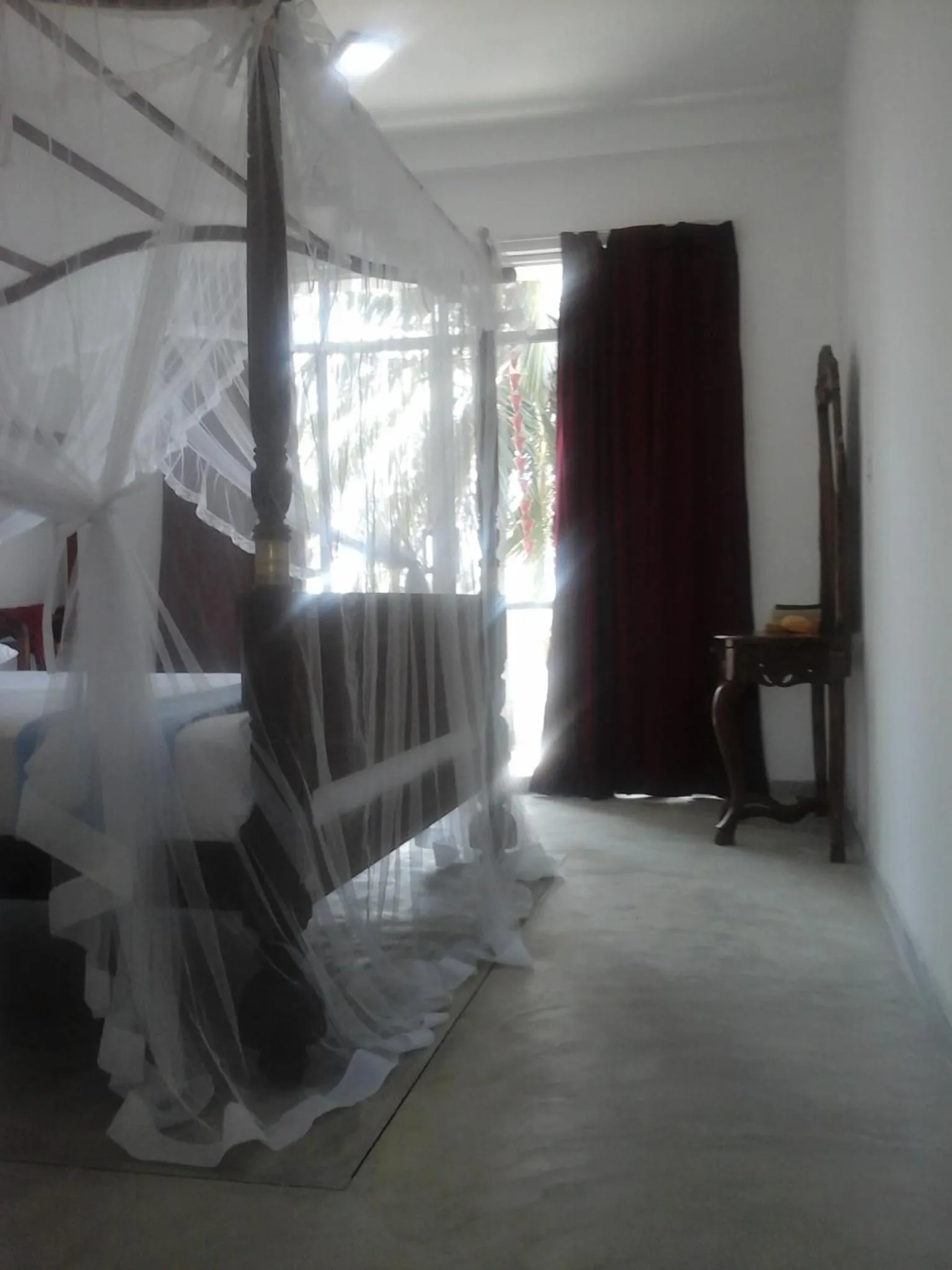 Photo of the whole room, Bed in Peacock Wings Guest