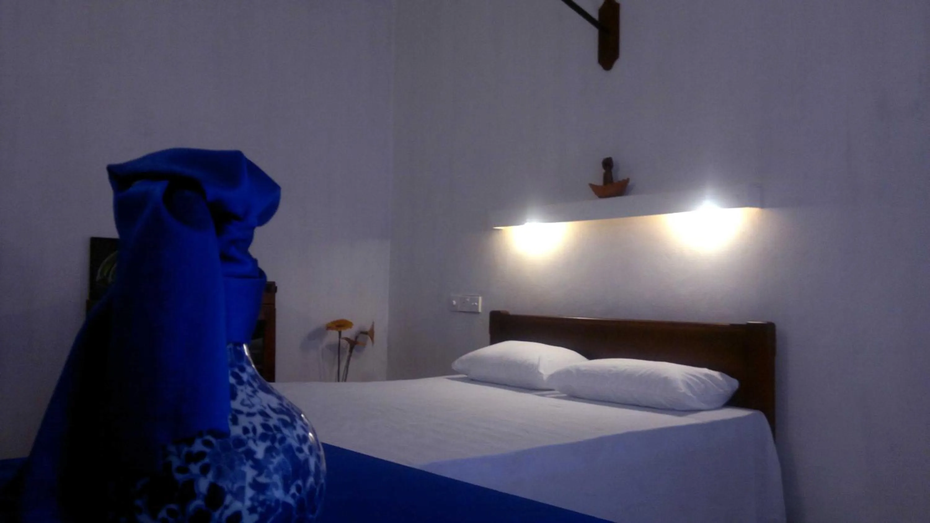 Bed in Peacock Wings Guest