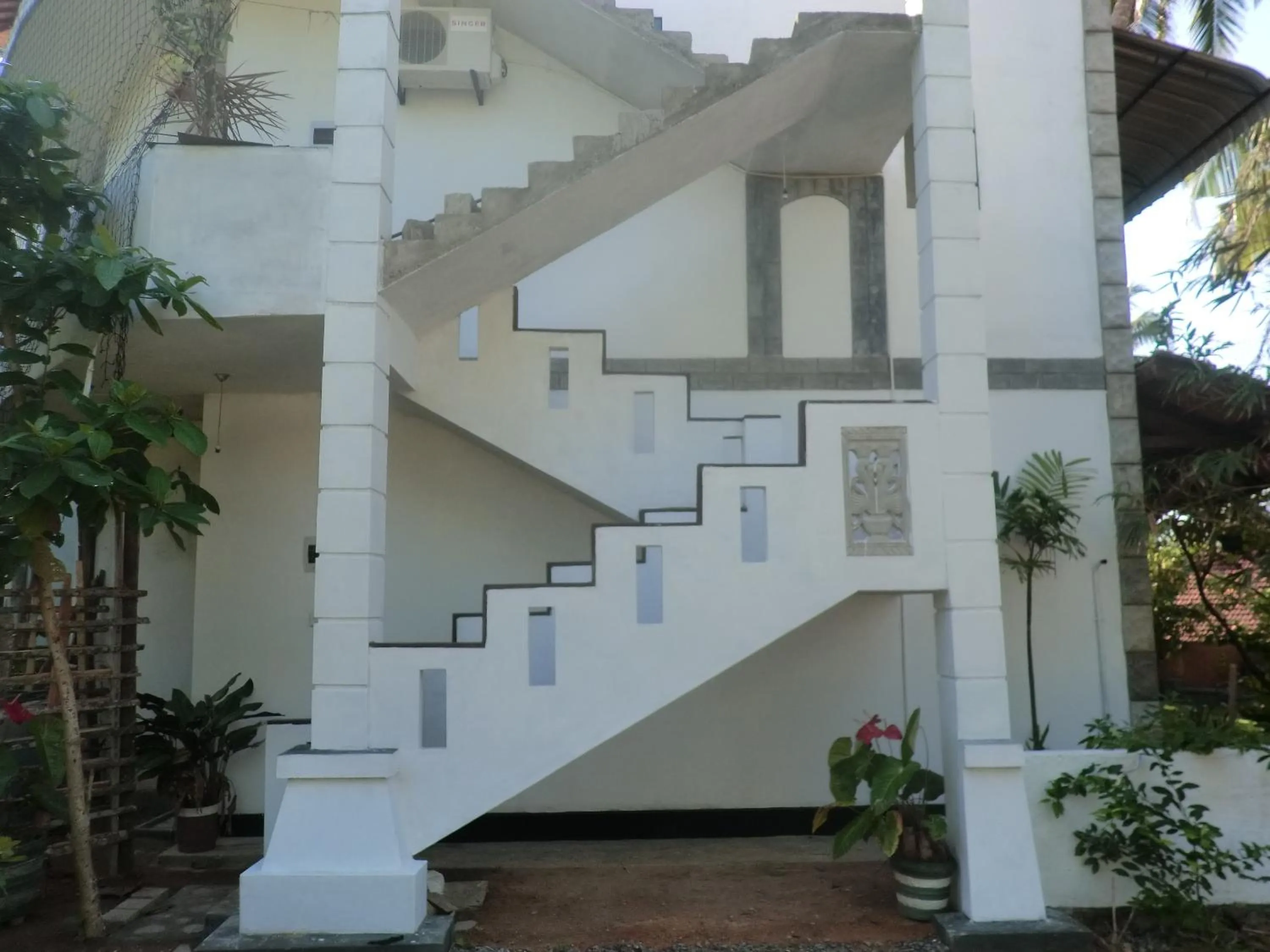 Facade/entrance in Peacock Wings Guest