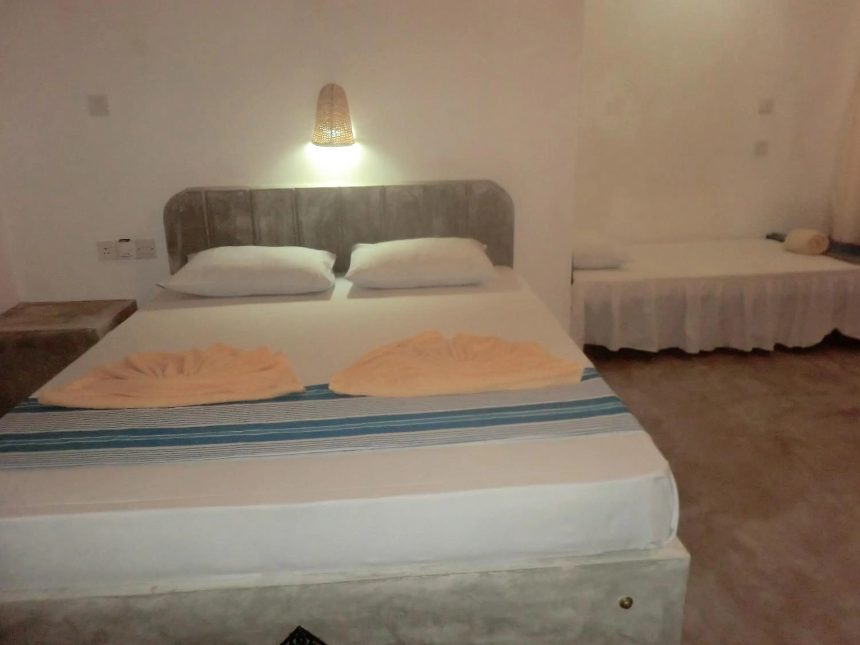 Bed in Peacock Wings Guest