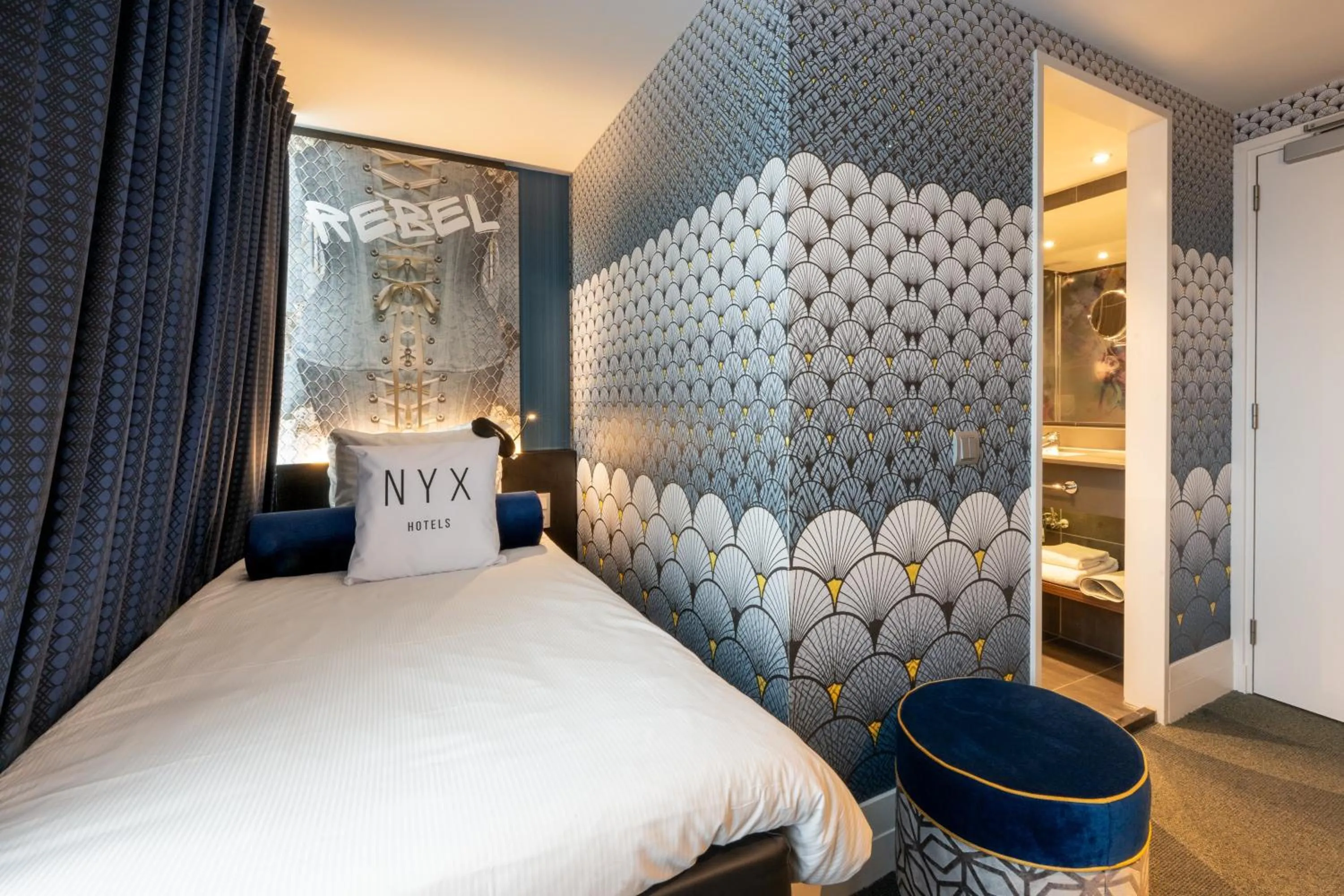 Photo of the whole room, Bed in NYX Hotel Amsterdam Rembrandt Square