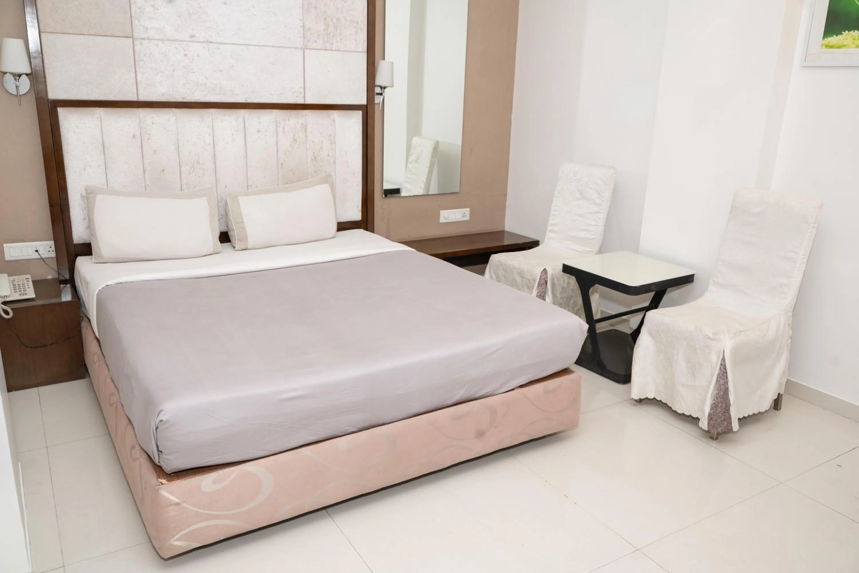 Bed in Hotel Executive Silver Inn