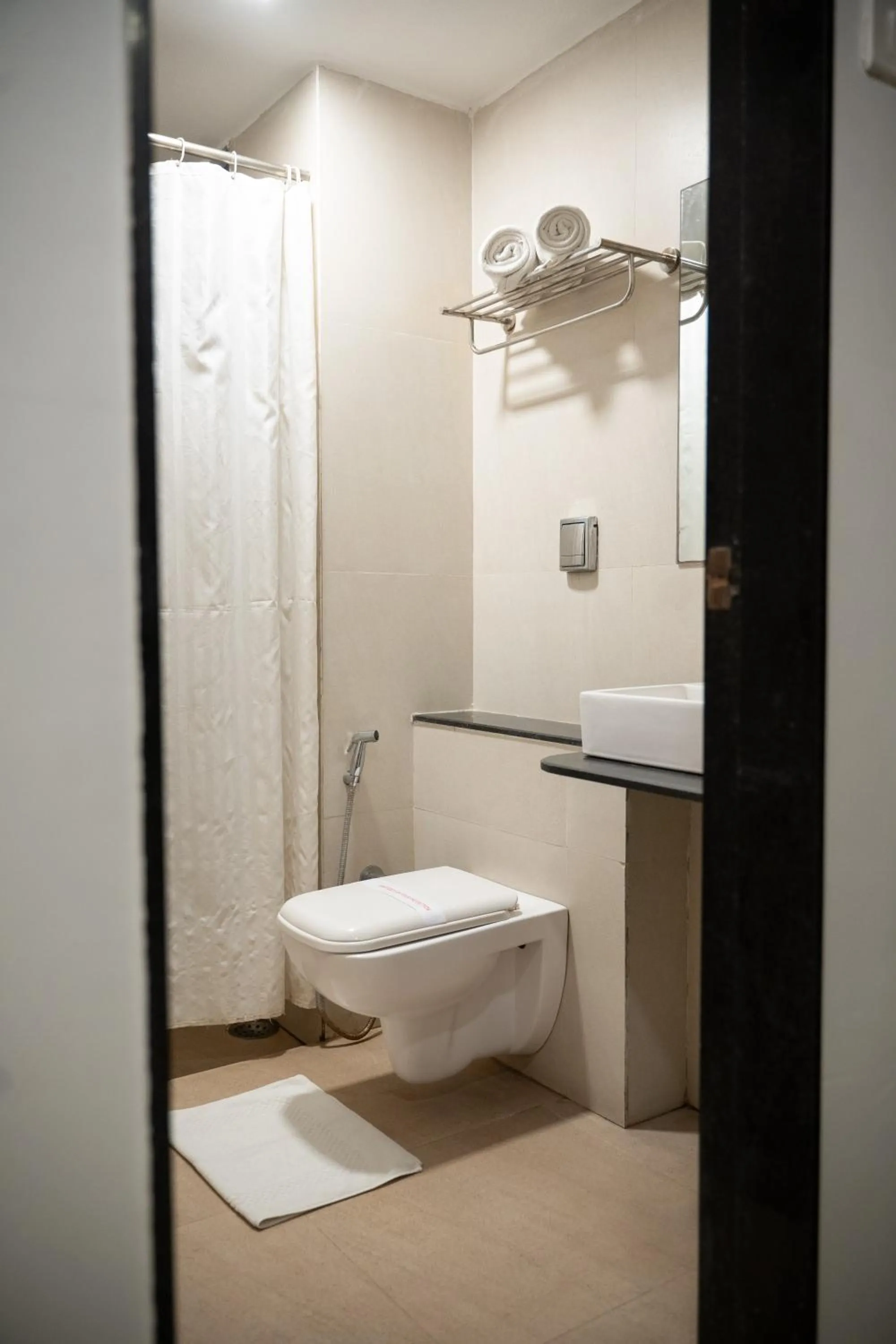 Toilet in Hotel Executive Silver Inn