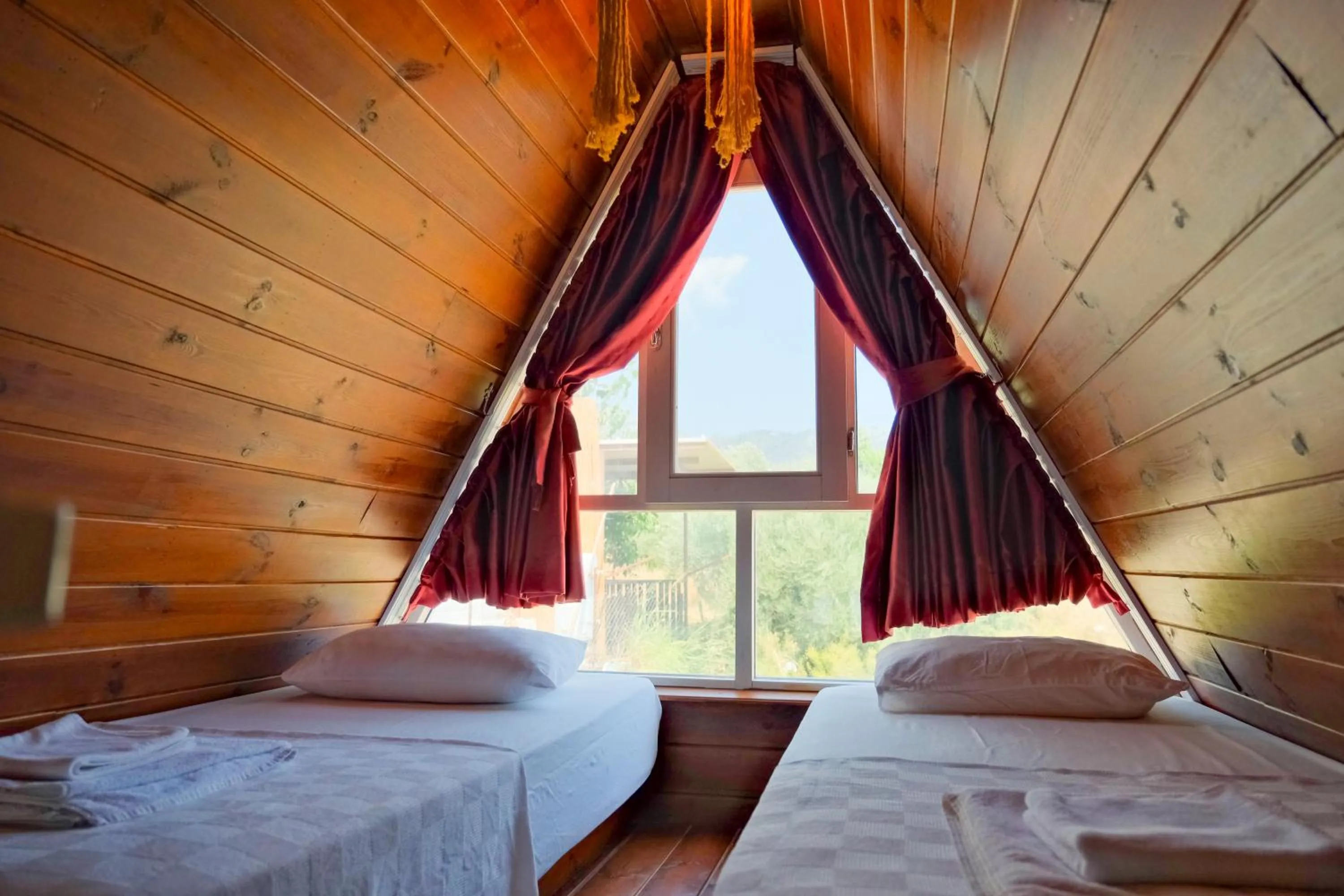 Bed in Bu Bungalow Hotel