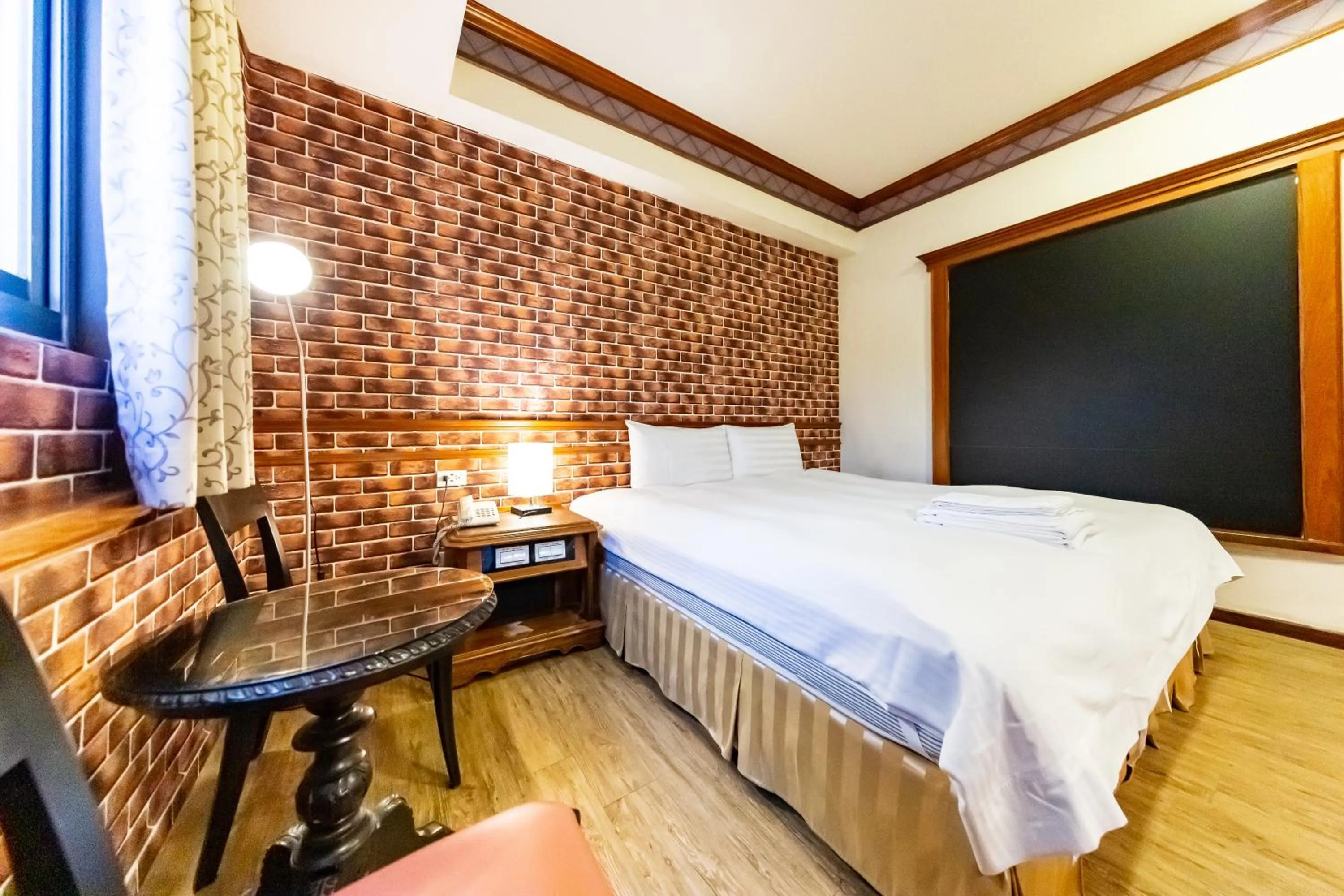 Bed in I HI Sanduo Travel Hotel