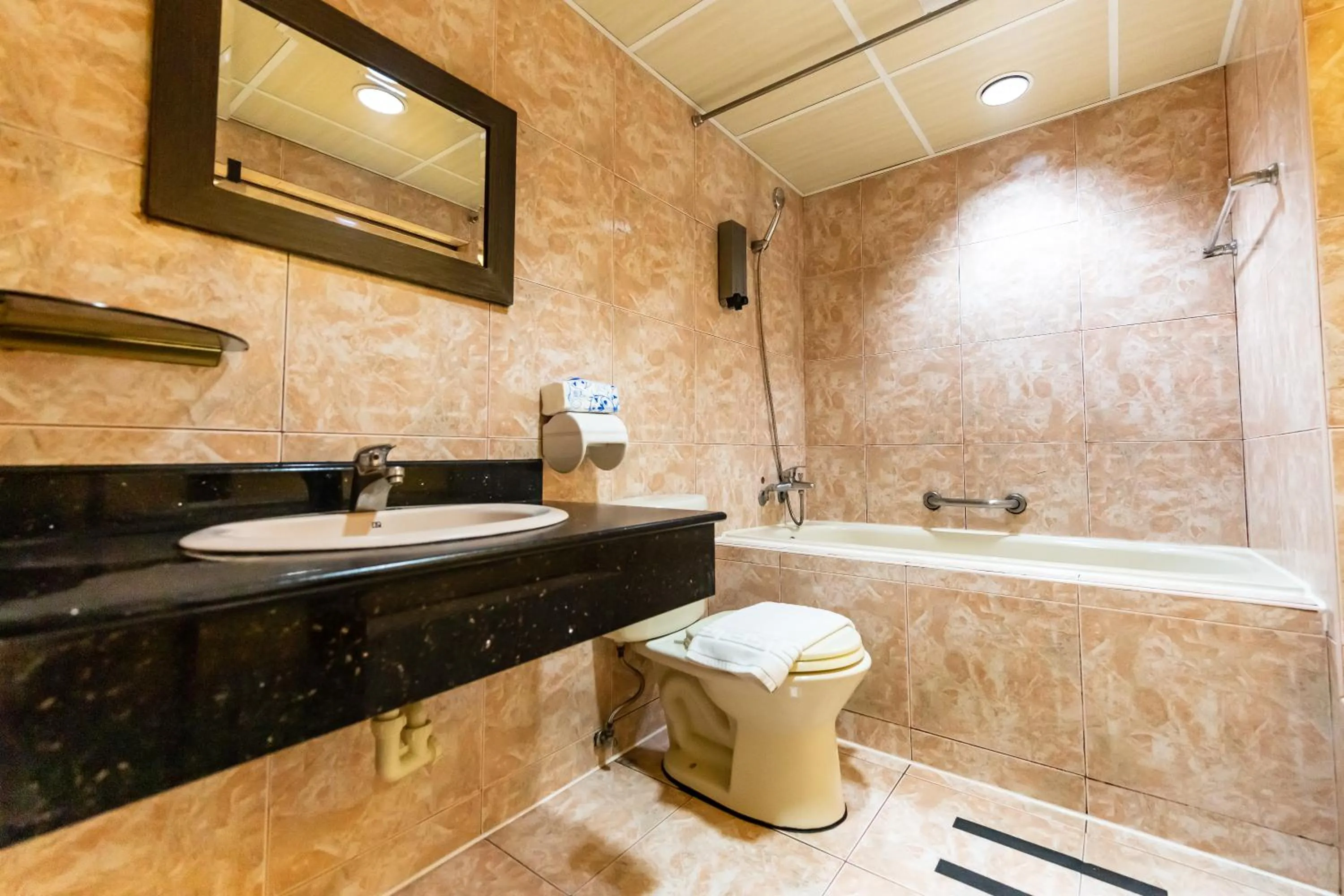 Bathroom in I HI Sanduo Travel Hotel