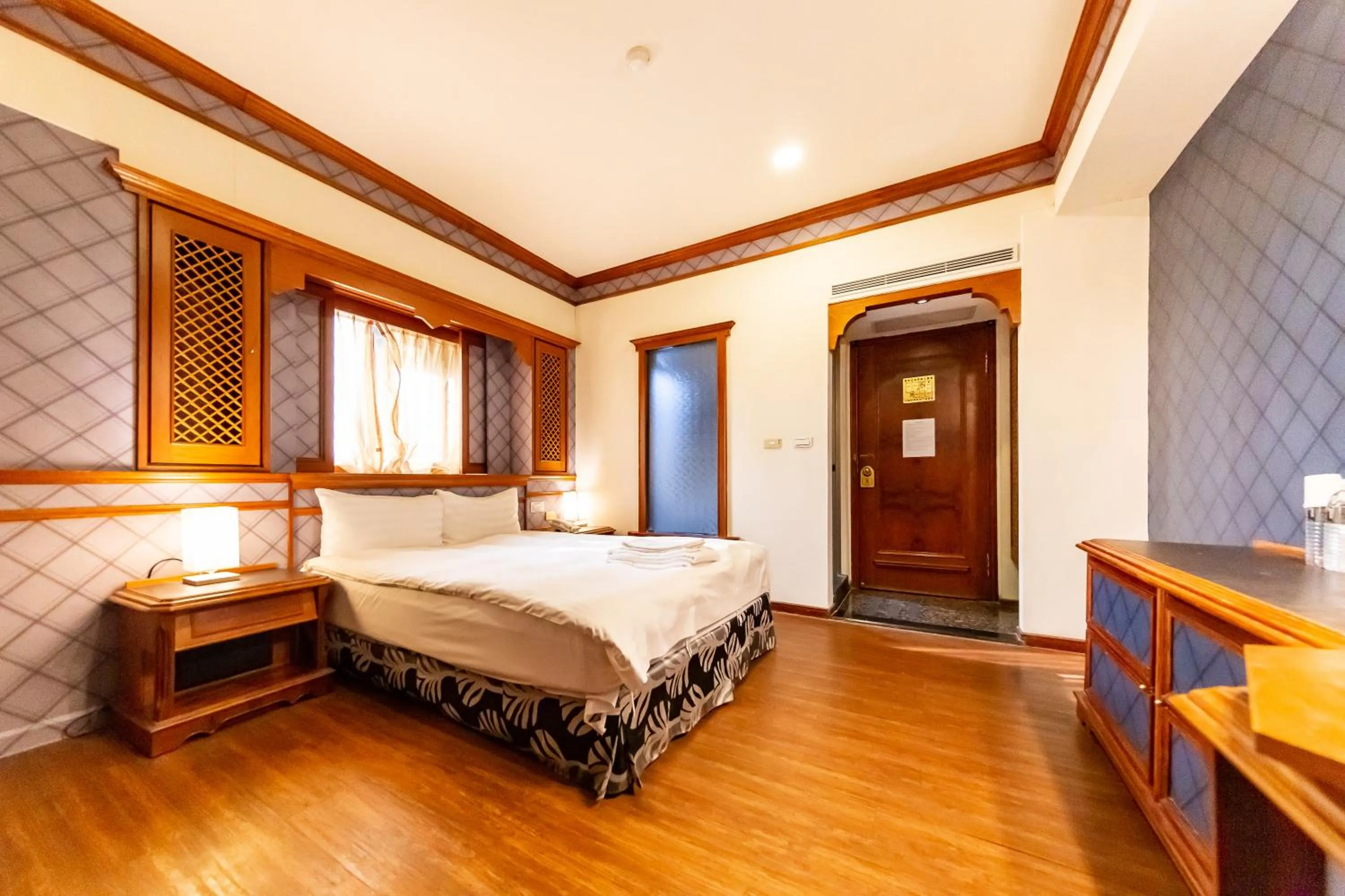 Bed in I HI Sanduo Travel Hotel