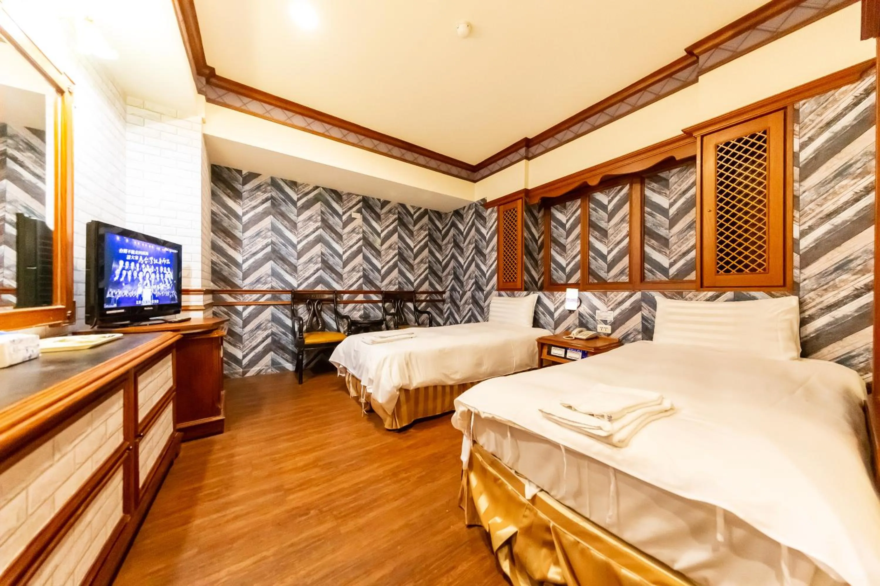 Bed in I HI Sanduo Travel Hotel