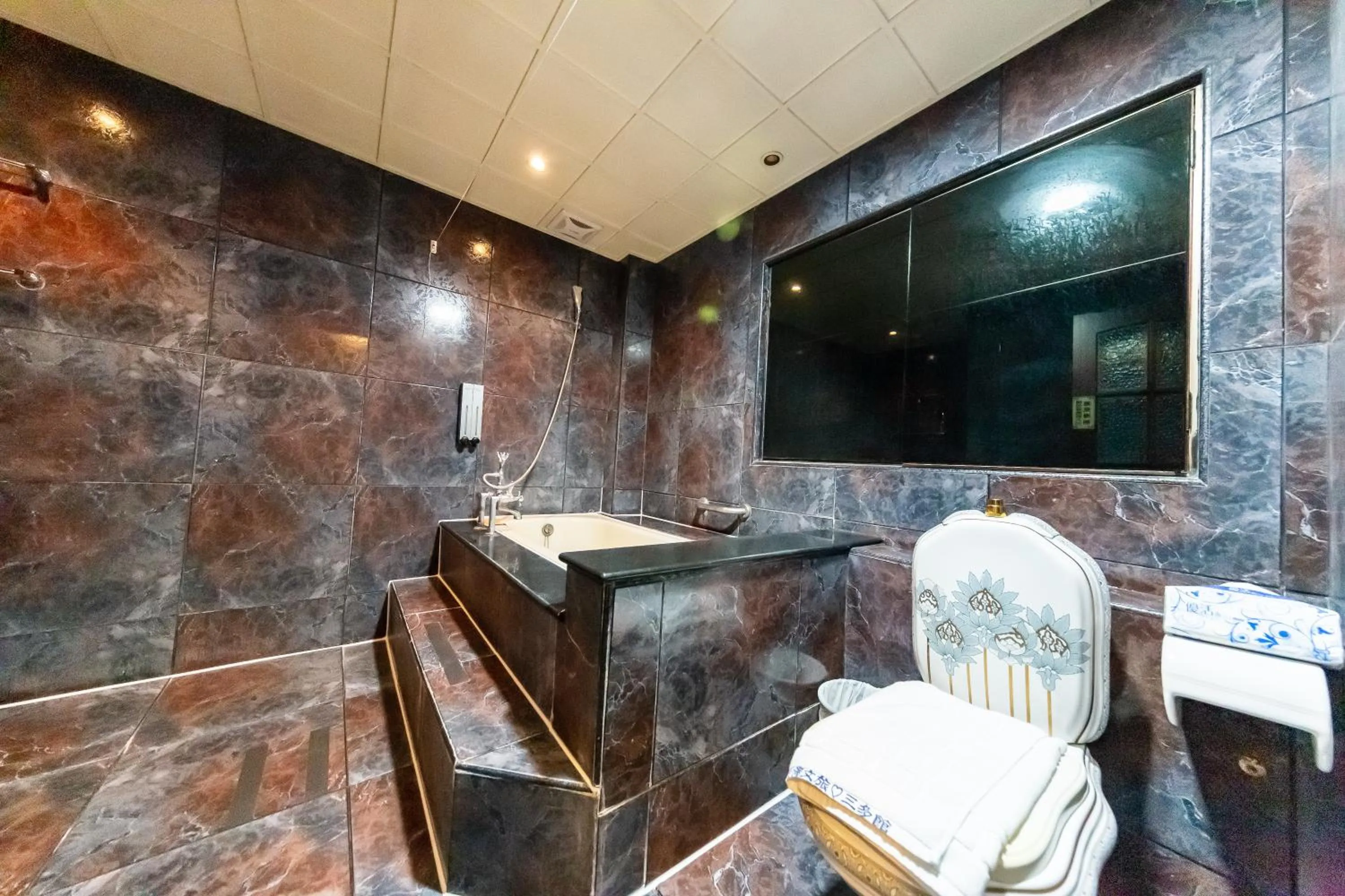 Bathroom in I HI Sanduo Travel Hotel