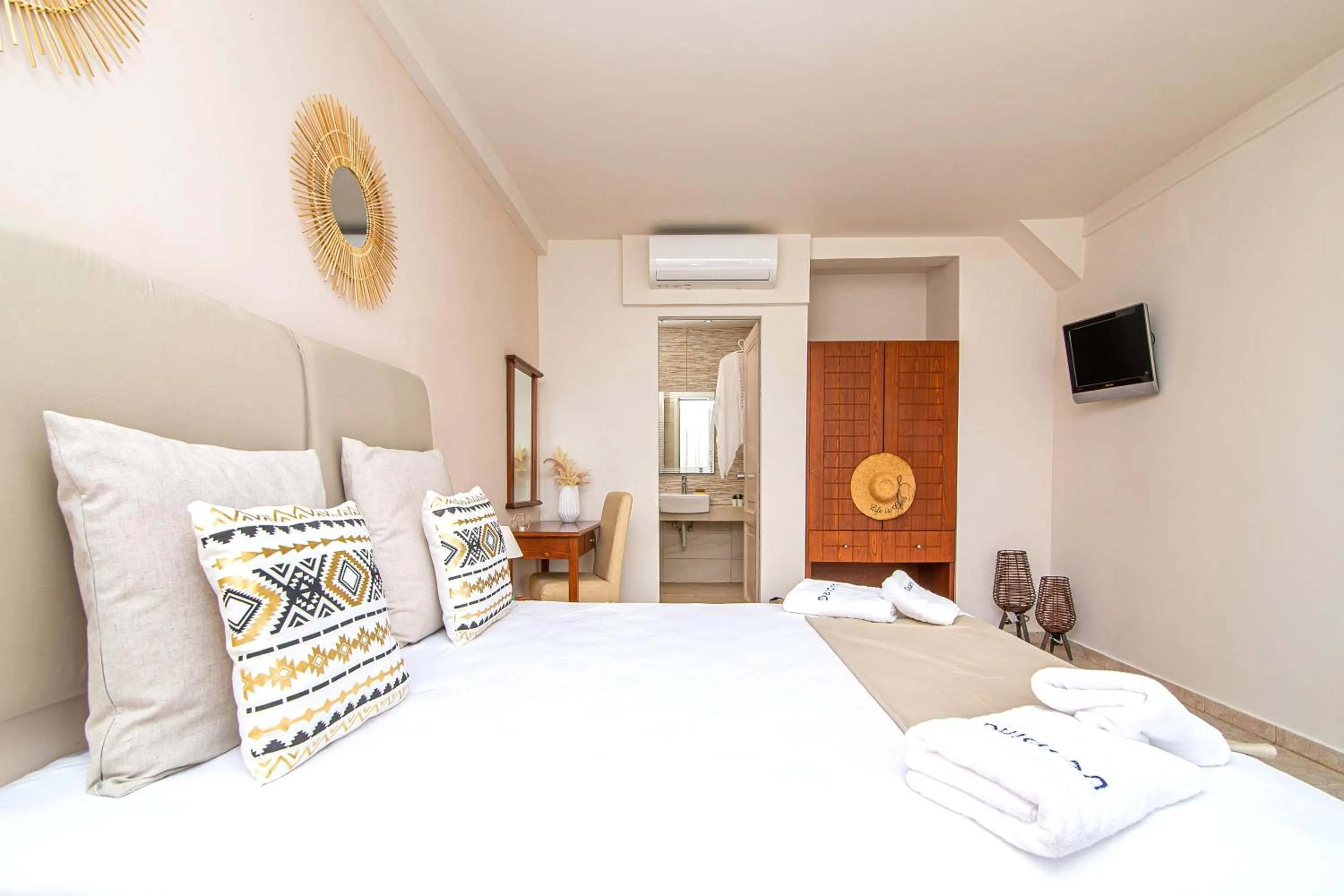 Bed in Despina Aparthotel by Philoxenia Hotel & SPA