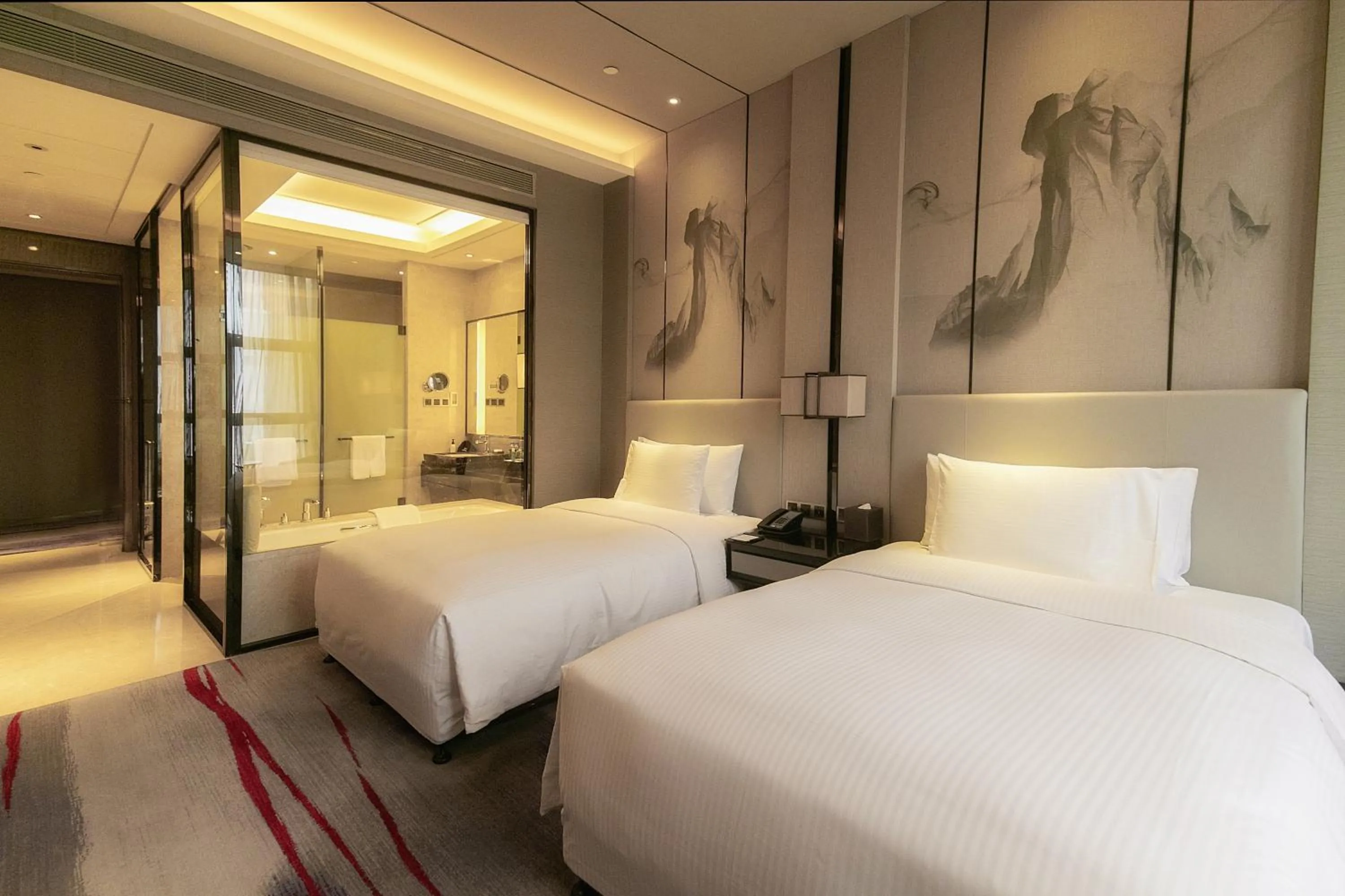 Bed in Maanshan Wanda Realm Hotel