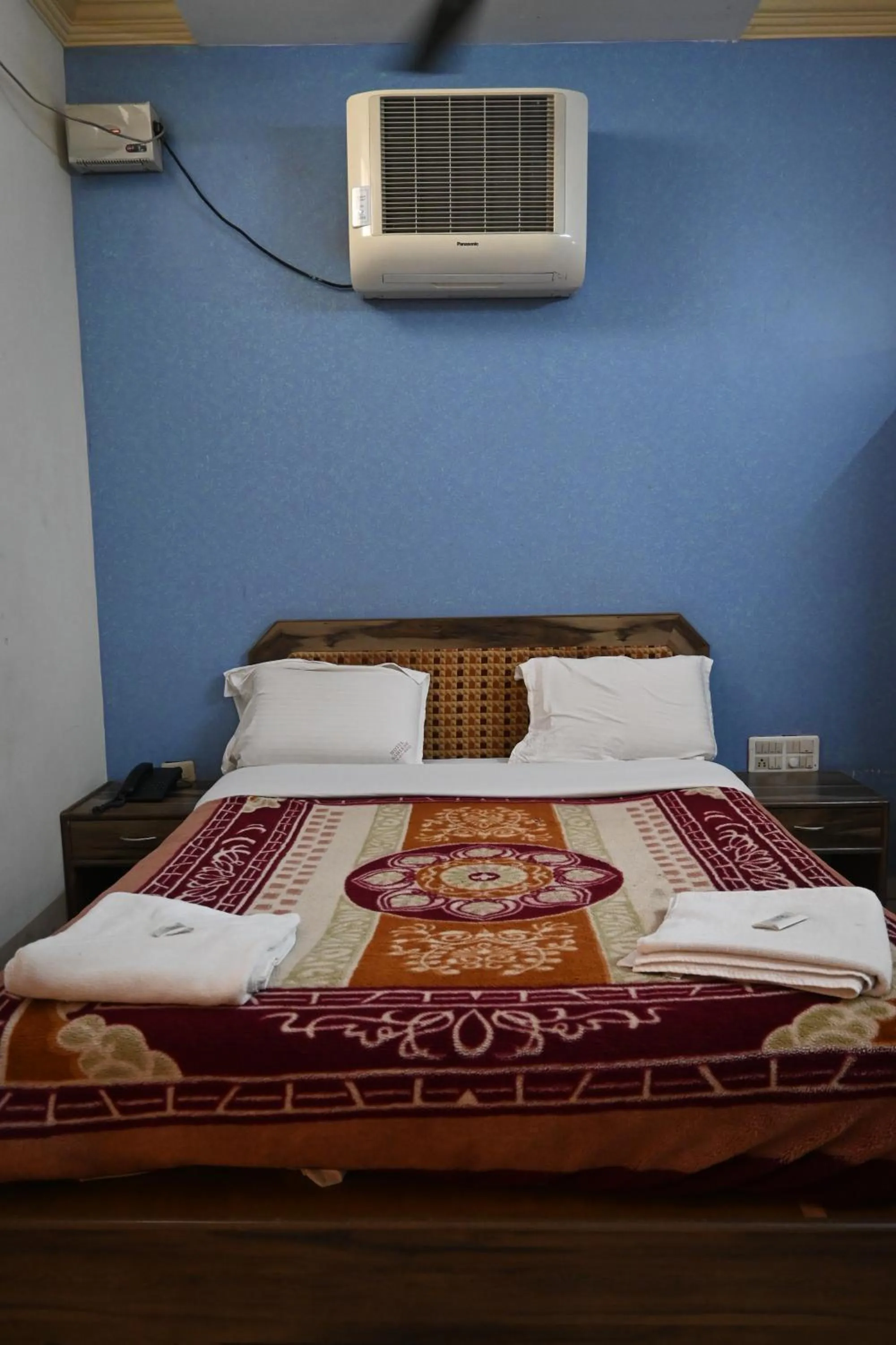 Bed in Hotel Ashlesh Manipal
