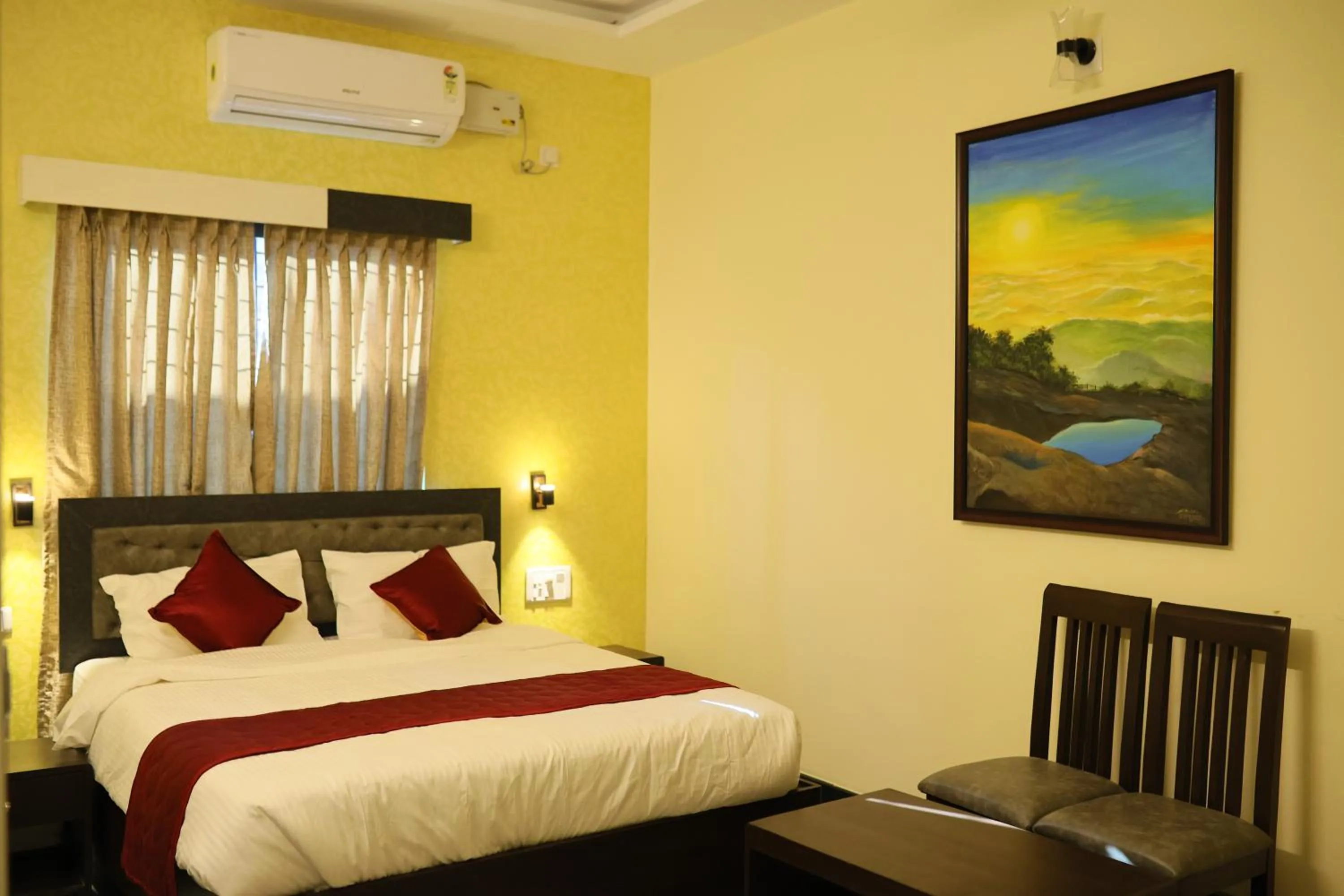 Bed in Hotel Ashlesh Manipal