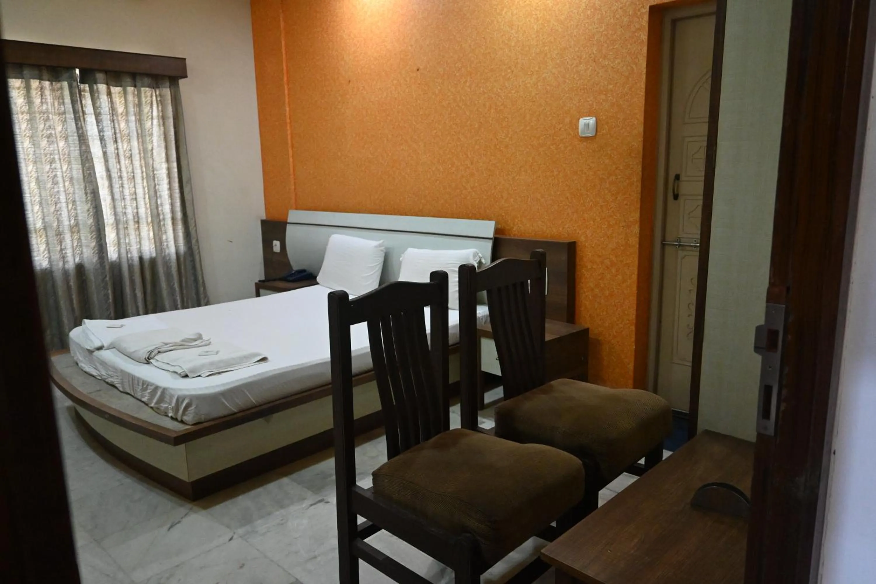 Bed in Hotel Ashlesh Manipal