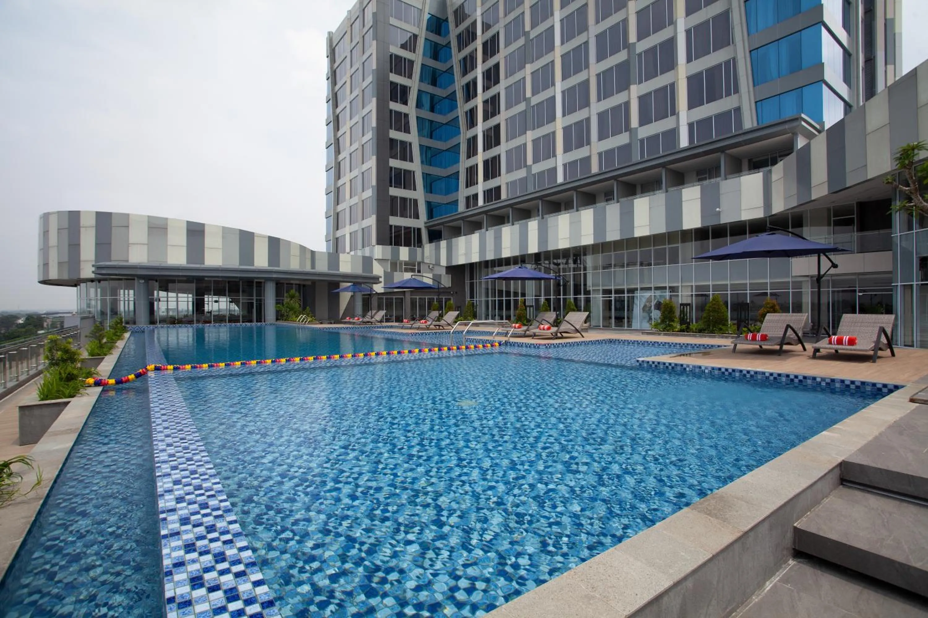 Swimming pool in HARRIS Hotel & Convention Cibinong City Mall Bogor