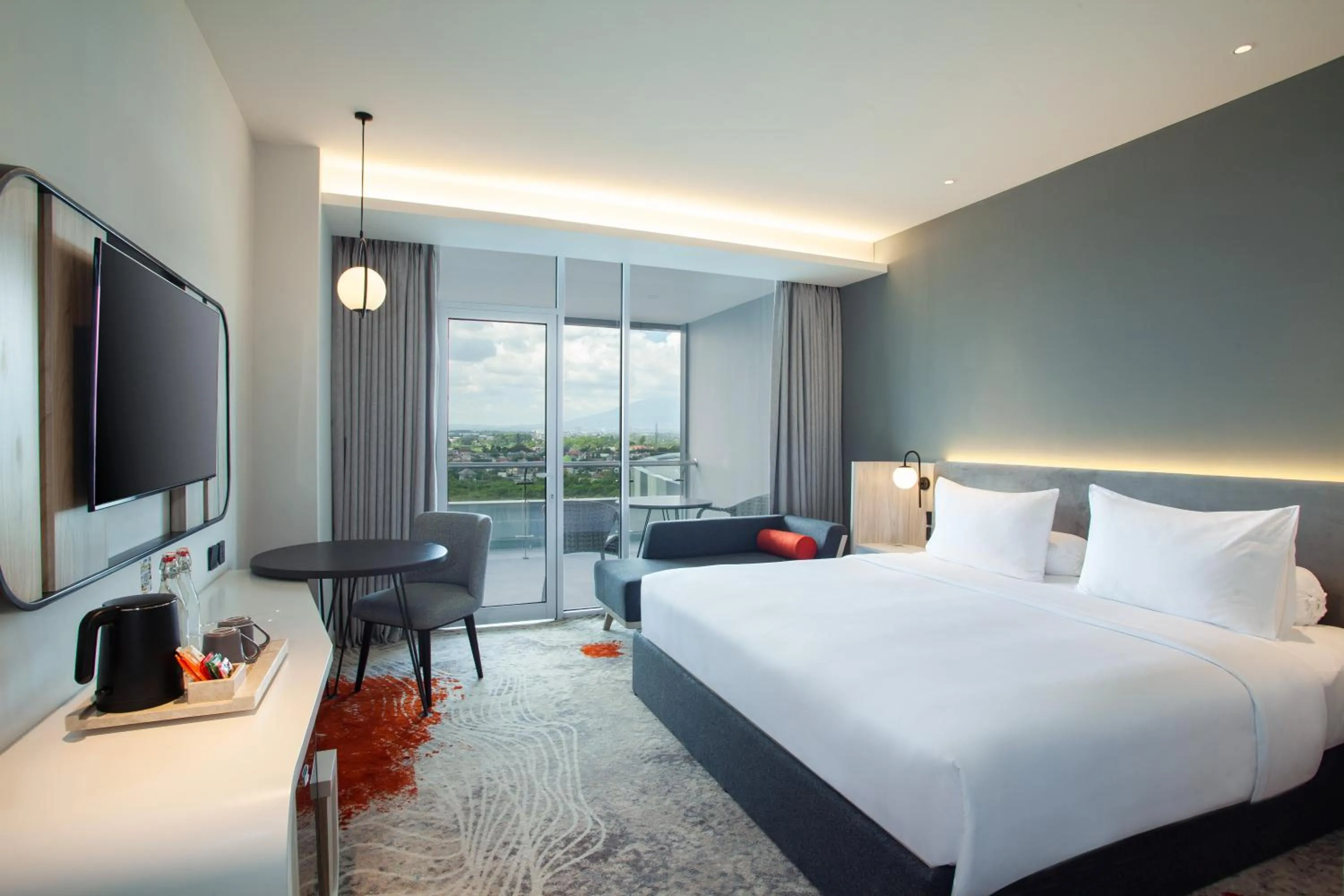 Balcony/Terrace, Bed in HARRIS Hotel & Convention Cibinong City Mall Bogor