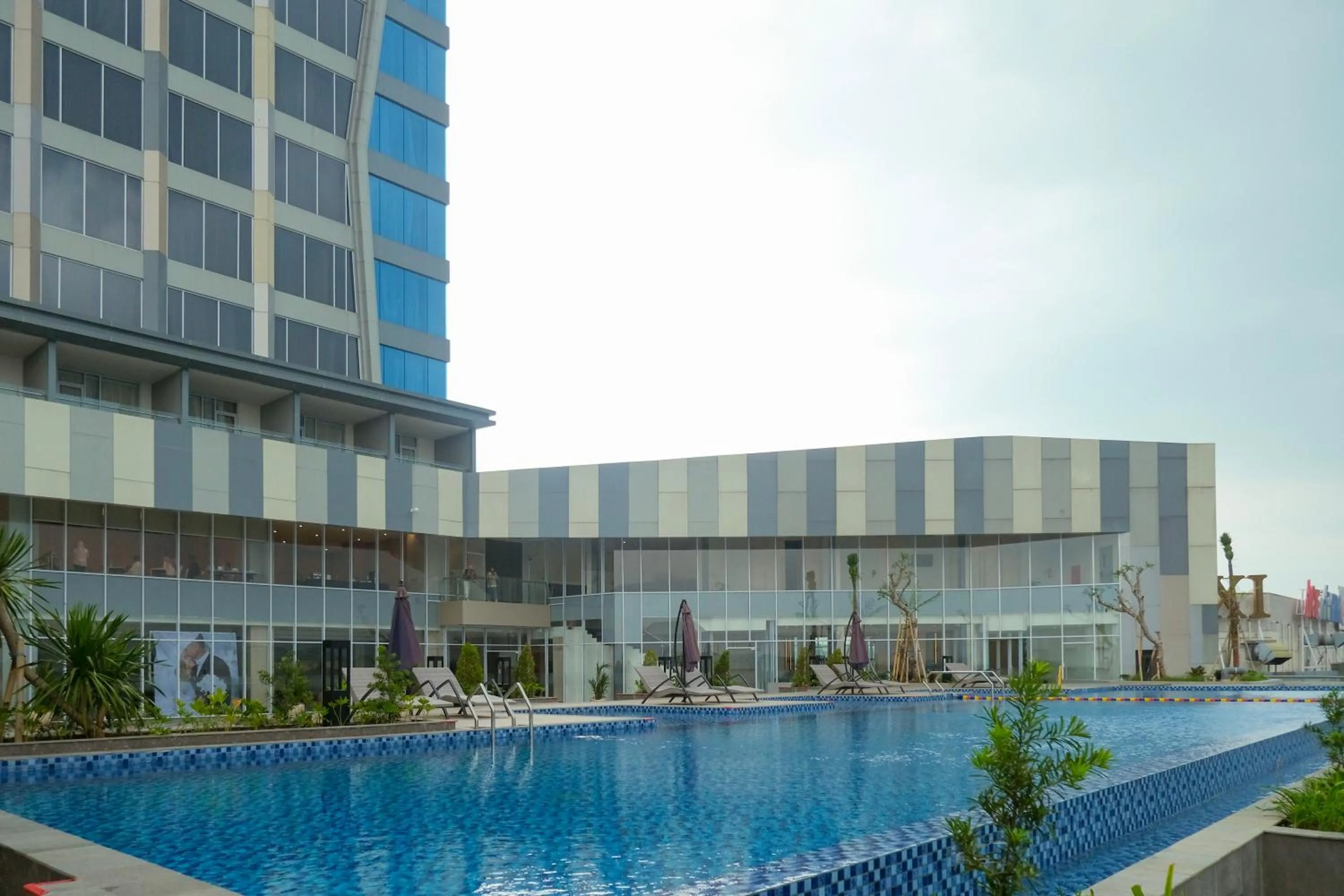 Swimming pool in HARRIS Hotel & Convention Cibinong City Mall Bogor