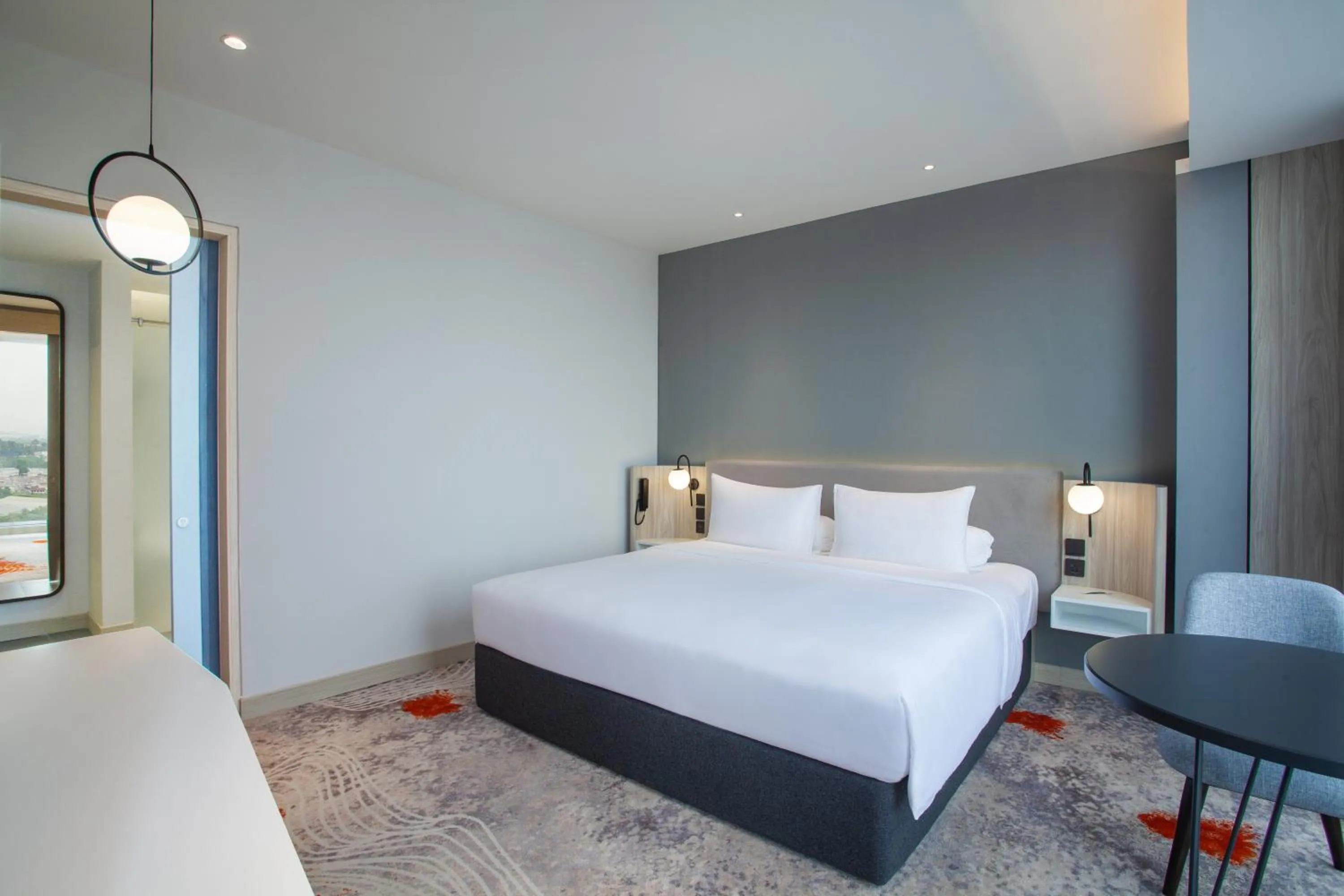 Bedroom, Bed in HARRIS Hotel & Convention Cibinong City Mall Bogor