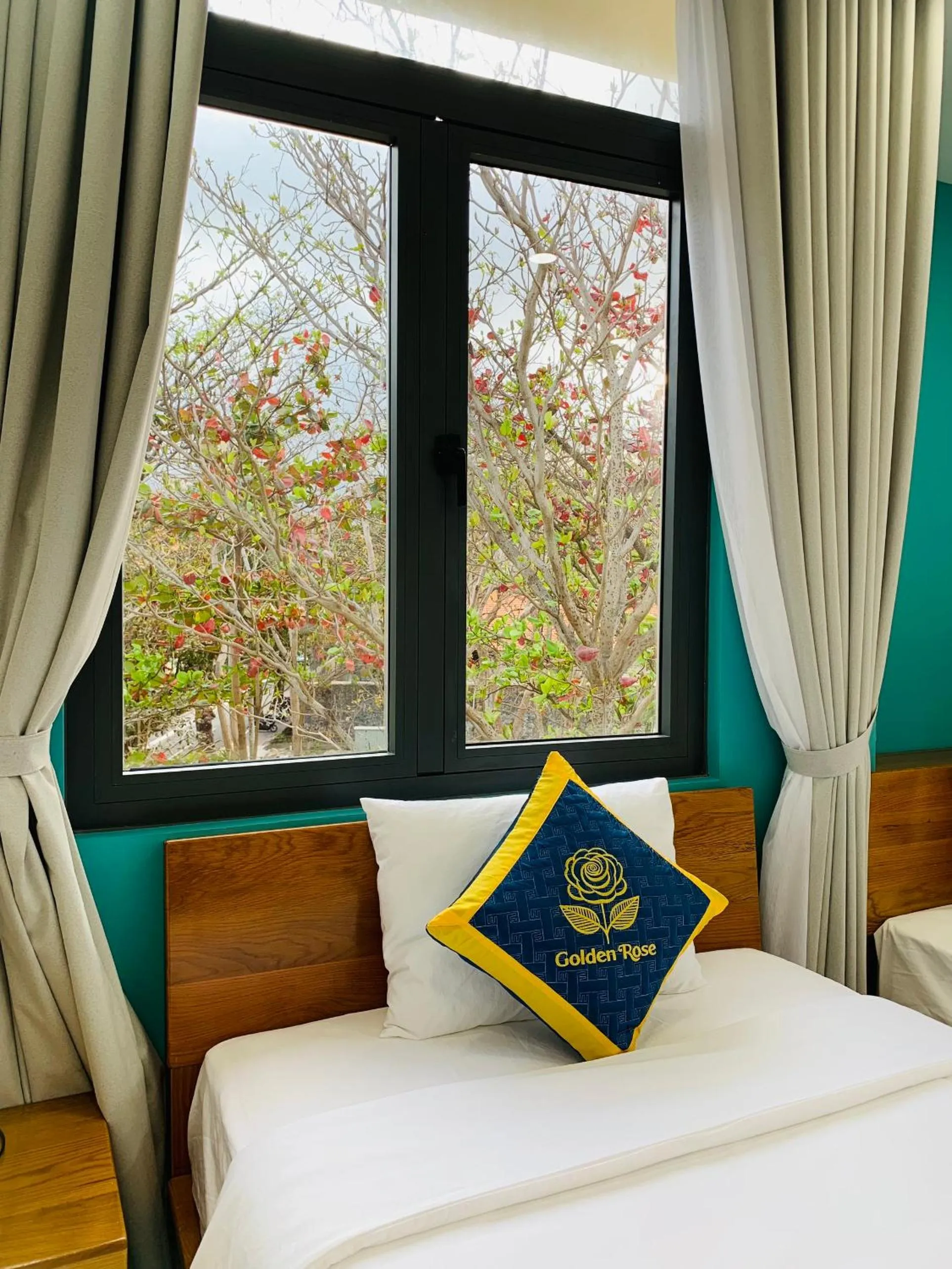 Bed in Golden Rose Hotel Con Dao