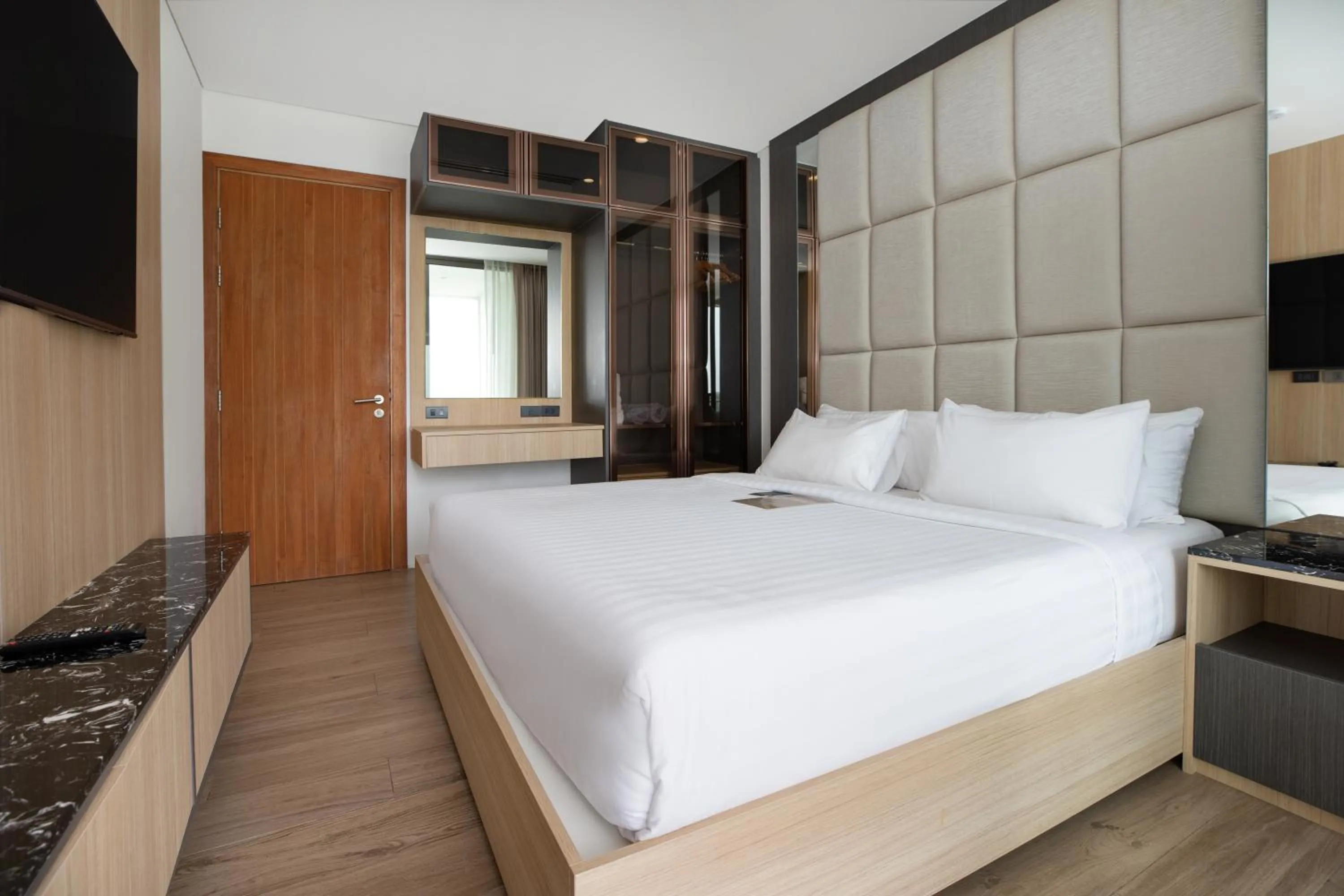 Bed in Elite Atoll Serviced Apartments Phuket