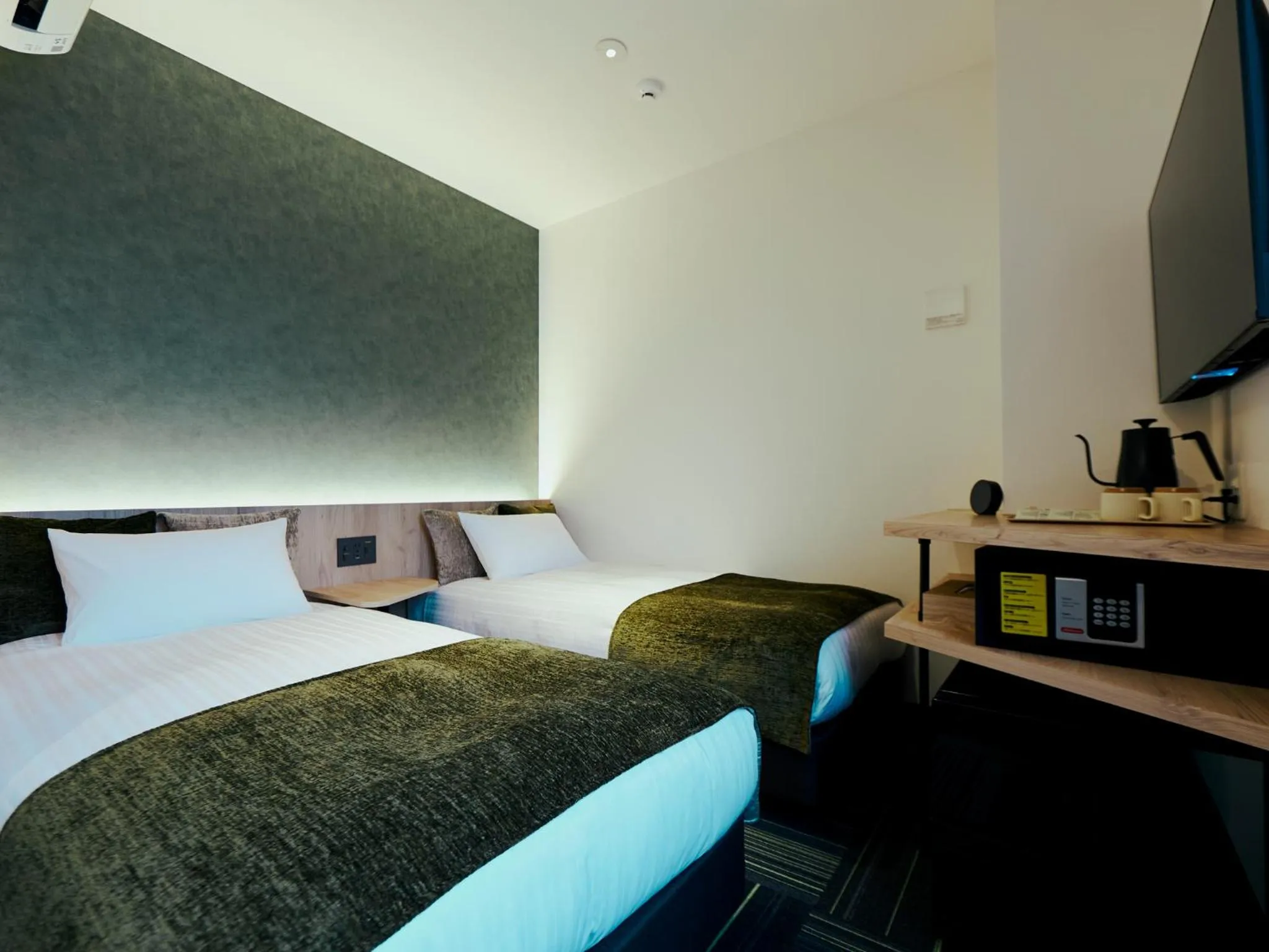 Bed in R Hotel Kansai Airport