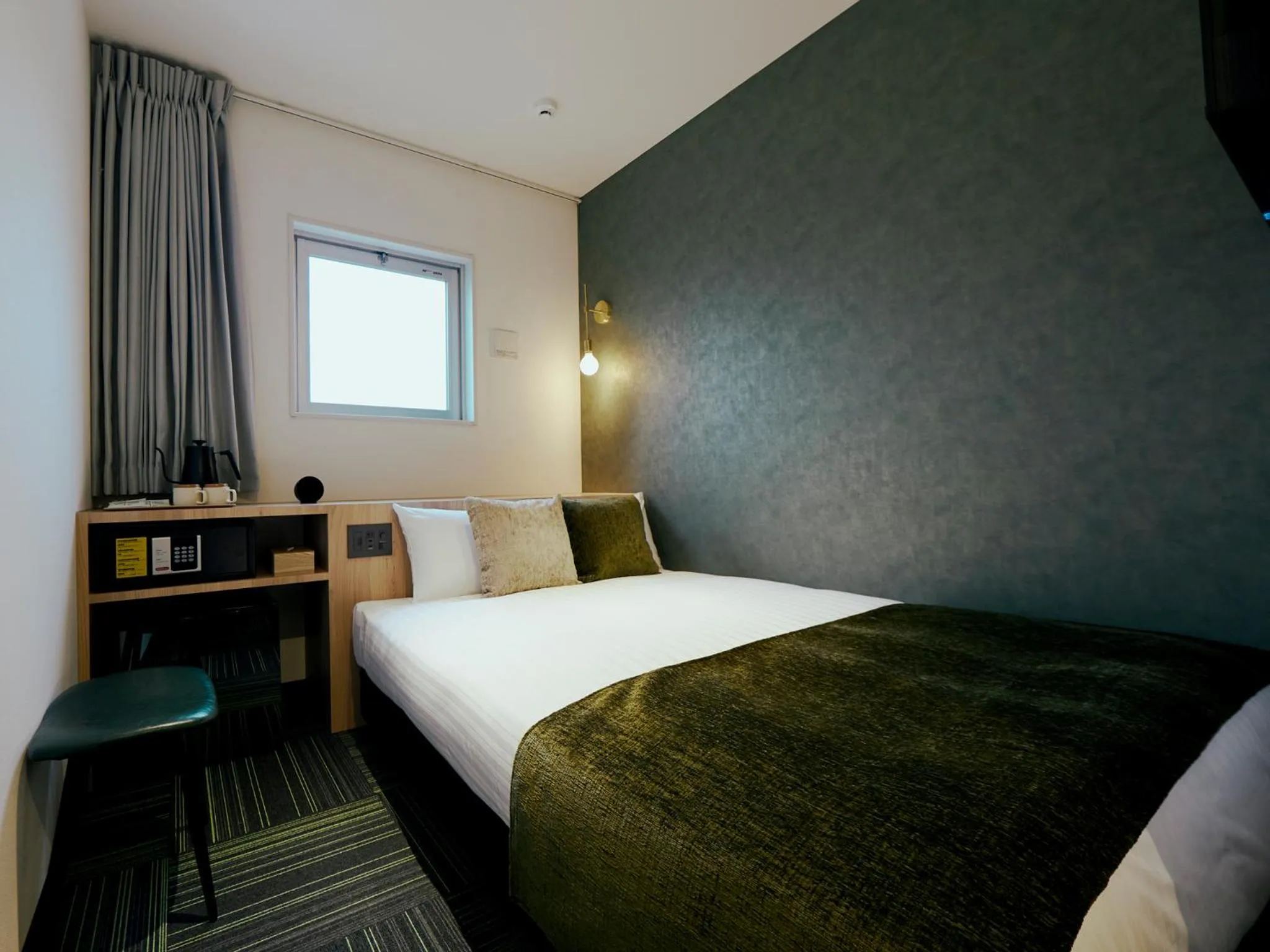 Bed in R Hotel Kansai Airport