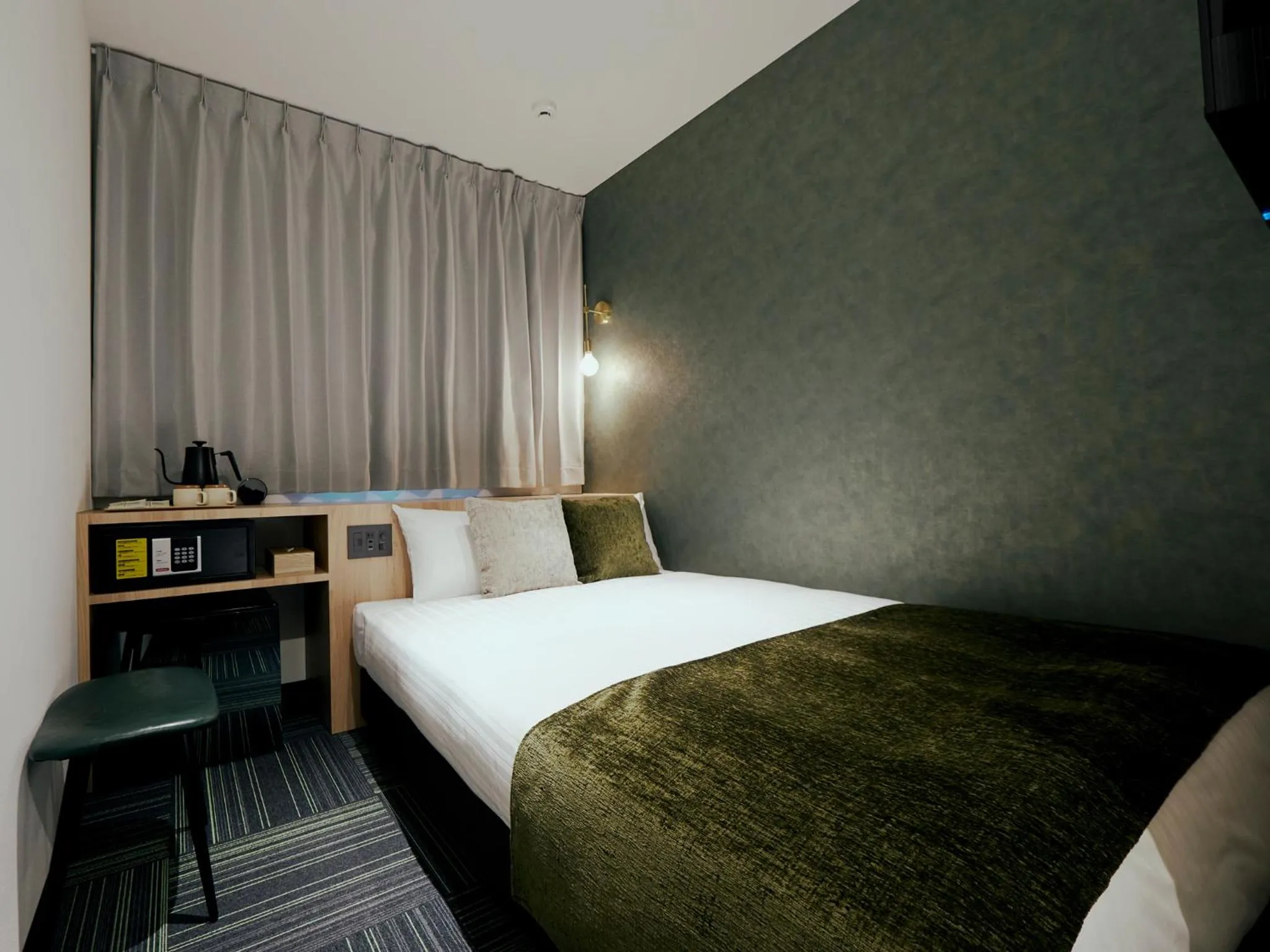 Bed in R Hotel Kansai Airport