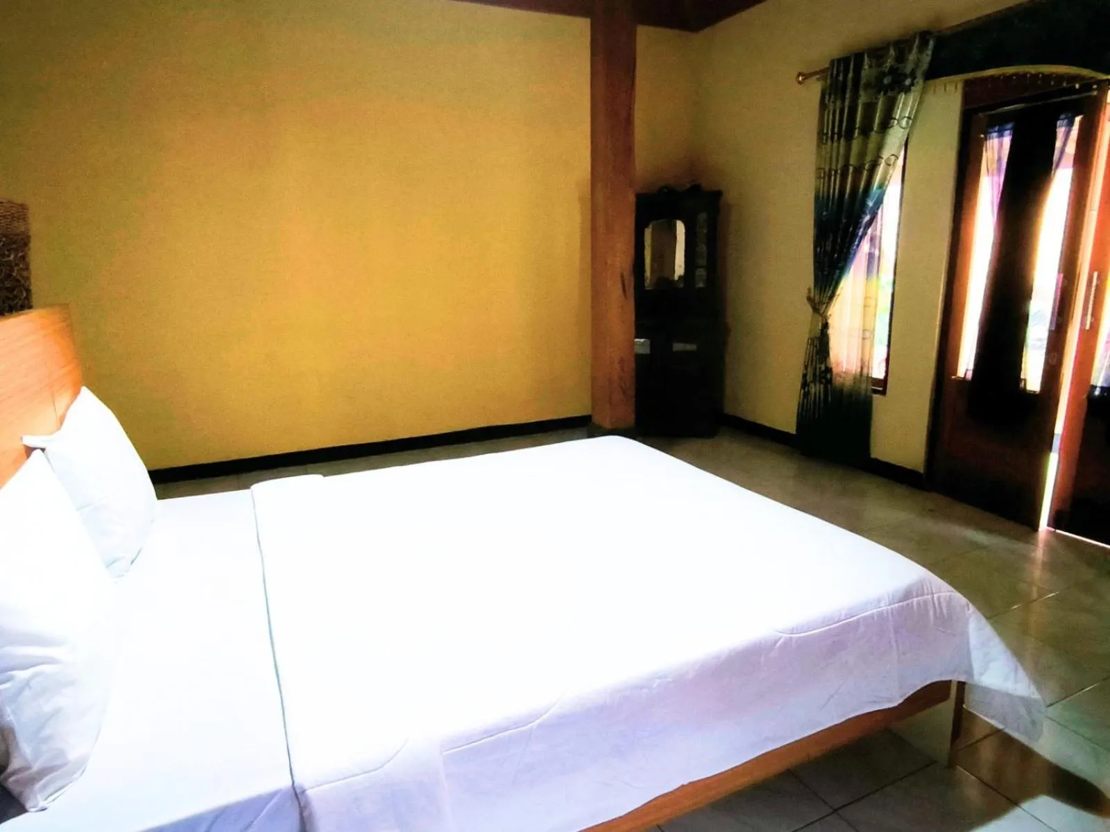 Bed in Villa Setumbu powered by Cocotel
