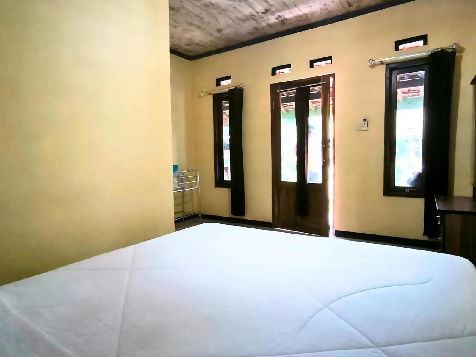 Bed in Villa Setumbu powered by Cocotel