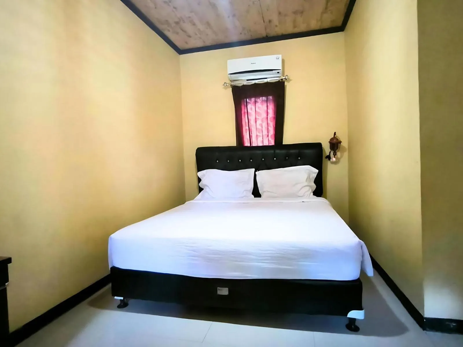 Bed in Villa Setumbu powered by Cocotel