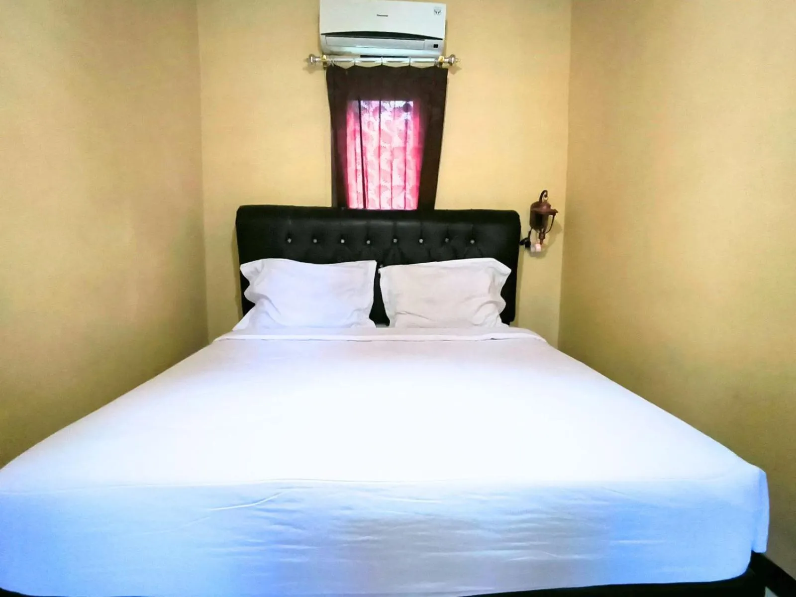 Bed in Villa Setumbu powered by Cocotel