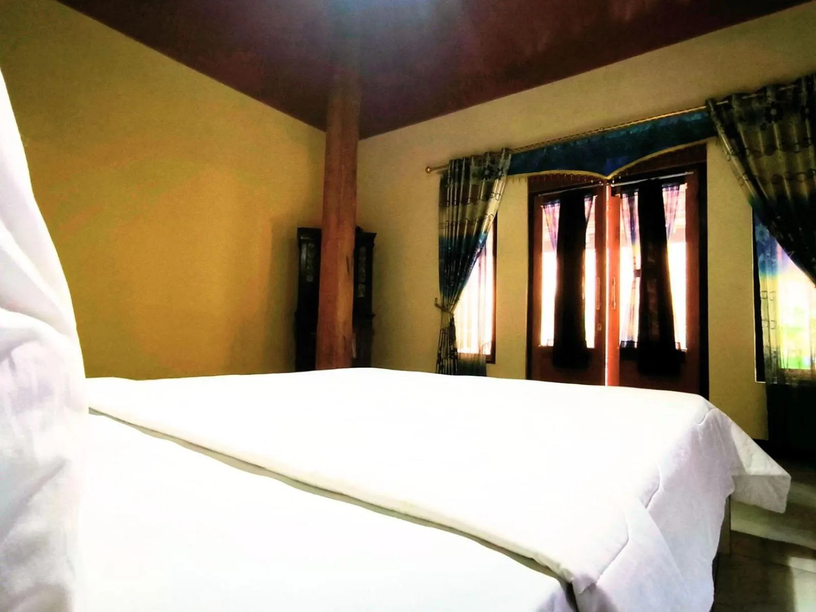 Bed in Villa Setumbu powered by Cocotel