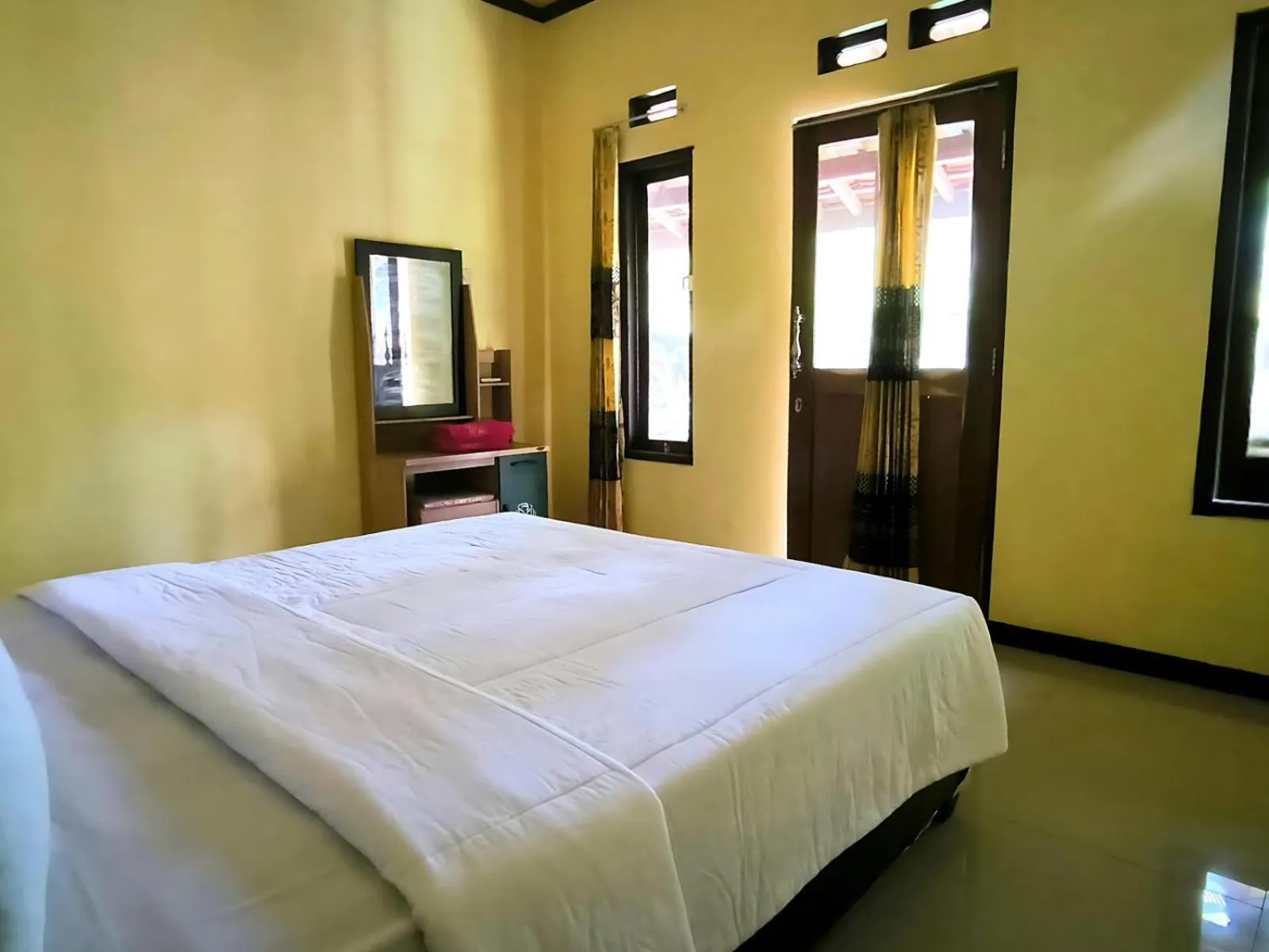 Bed in Villa Setumbu powered by Cocotel